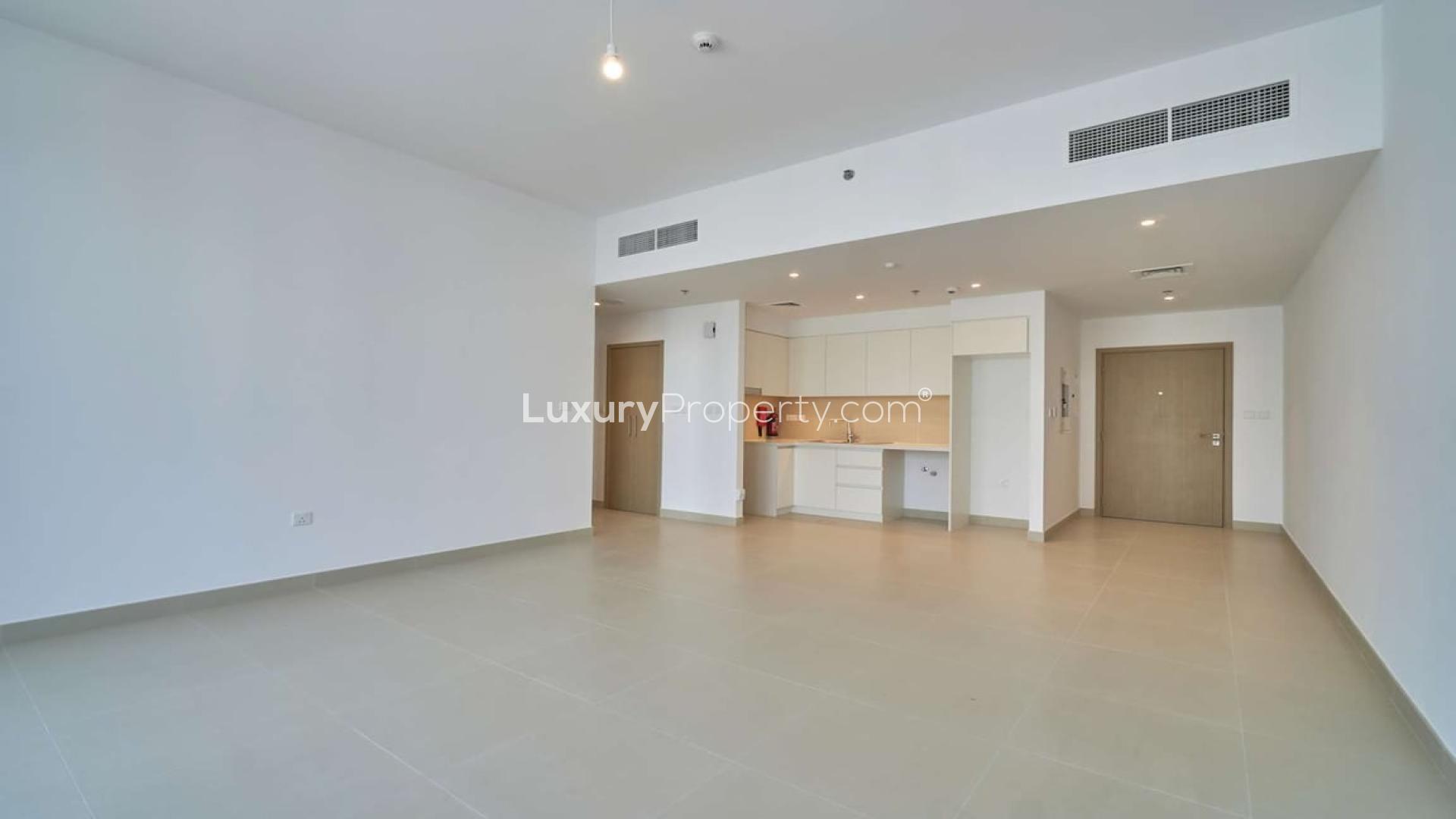Modern open-plan living area in 1-bedroom apartment, Creek Horizon, Dubai Creek Harbour