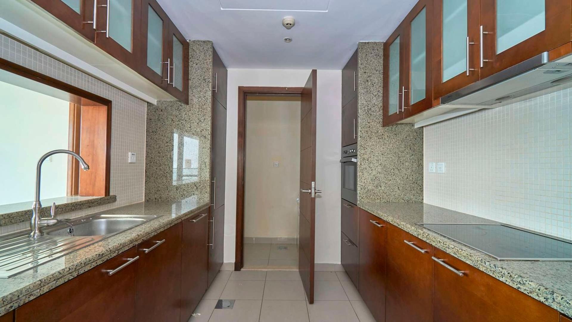 Aerial view of Downtown Dubai skyscrapers and canal near South Ridge apartment