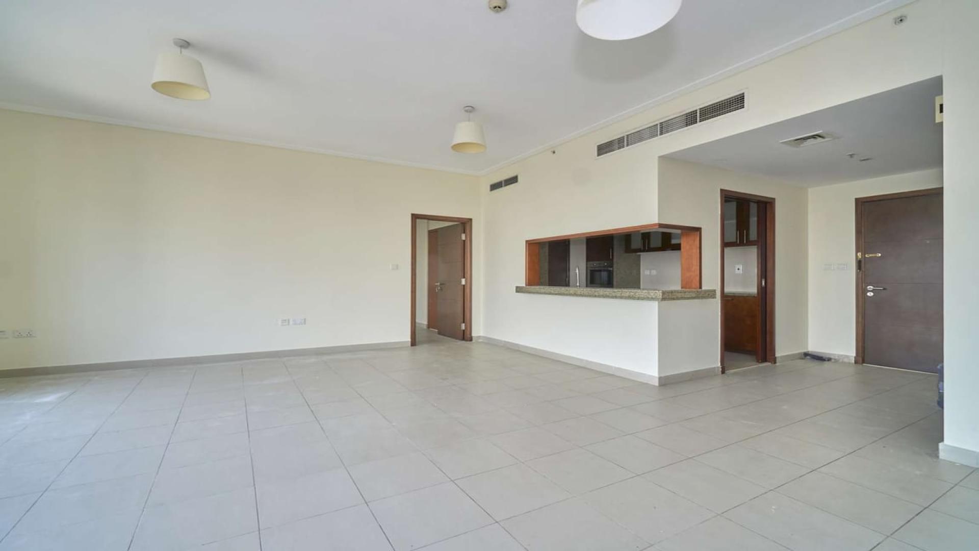 Spacious living area in 1-bedroom apartment, South Ridge, Downtown Dubai, with open kitchen