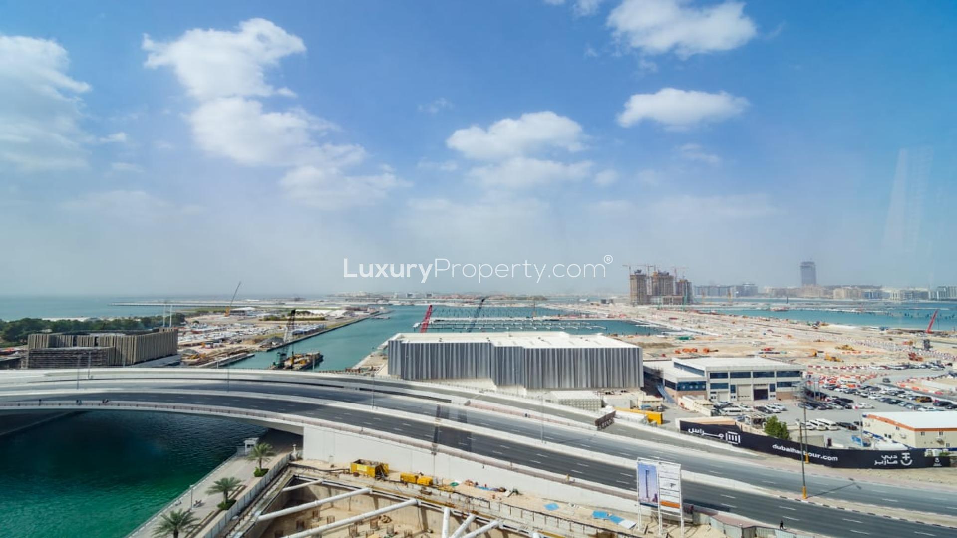 Bright living area in 1-bed apartment, Cayan Tower, Dubai Marina, large windows, city view