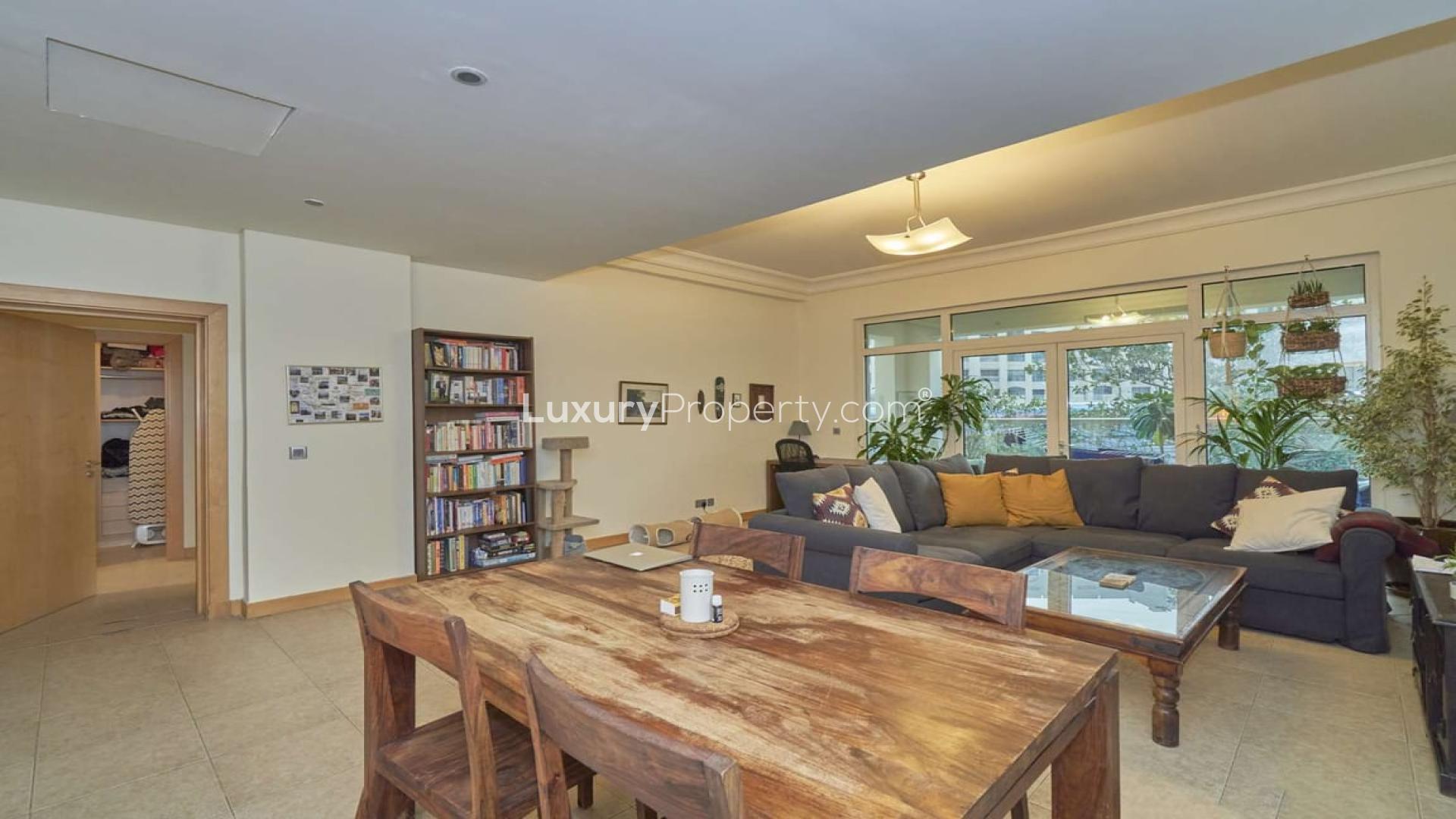 Balcony view from 1-bedroom apartment in Shoreline Residences, Palm Jumeirah with garden scenery