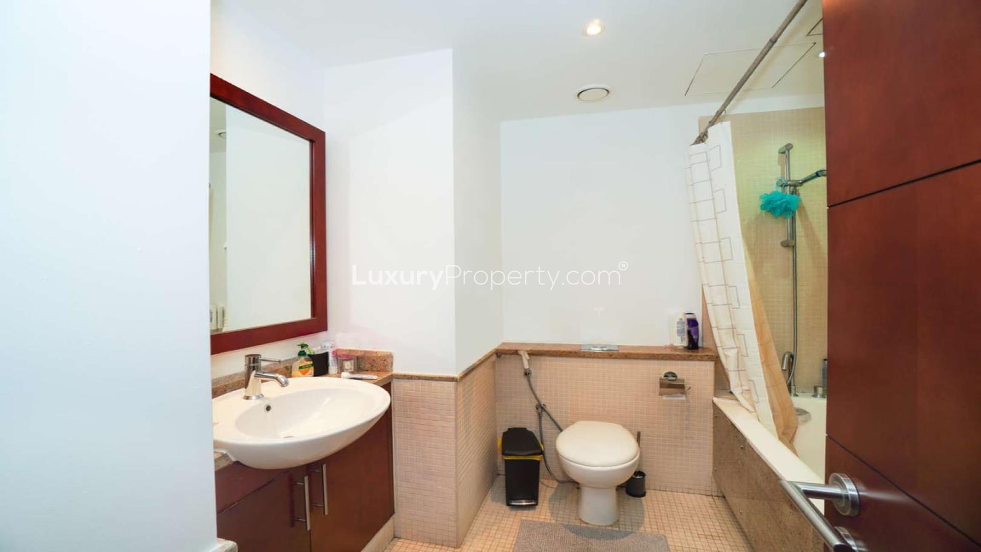 Modern living room in South Ridge apartment, Downtown Dubai, with large windows and stylish decor