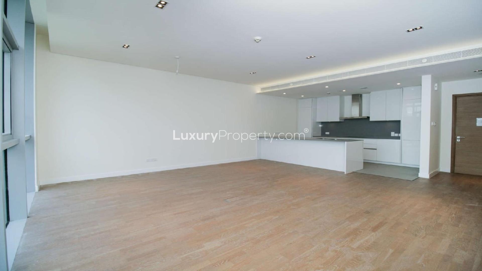 Empty room with large windows at City Walk Residences, Dubai, Building 15 apartment