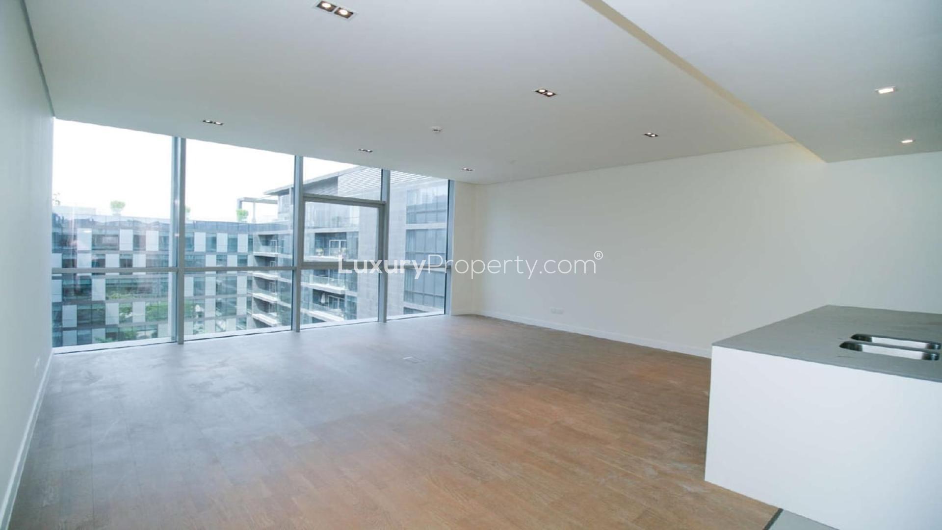 Contemporary one-bedroom apartment interior with large windows in City Walk's Building 20