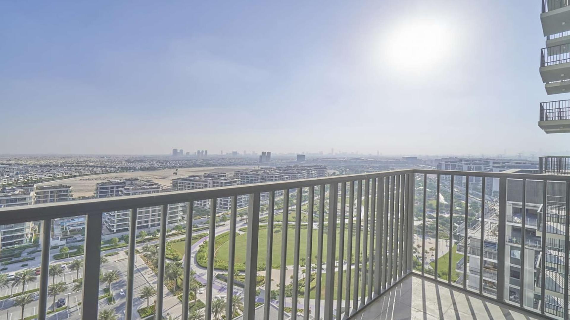 Balcony view from 1-bedroom apartment in Park Ridge, Dubai Hills Estate overlooking cityscape