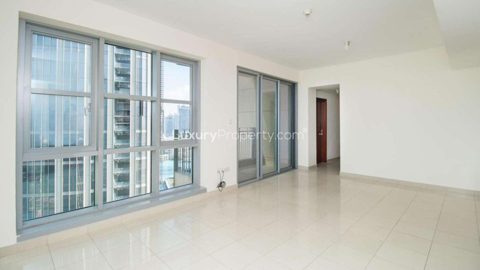 One-bedroom apartment interior with large windows and city views in Downtown Dubai