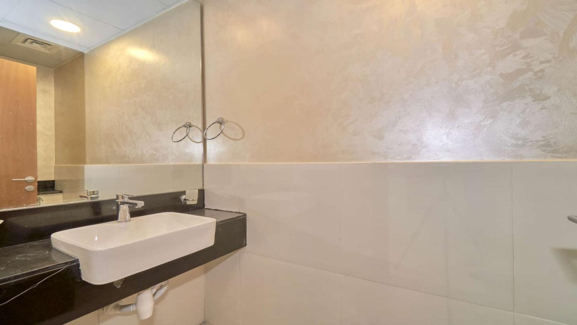 Cosy 1-bedroom apartment interior with city view at Millennium Binghatti Residences, Business Bay