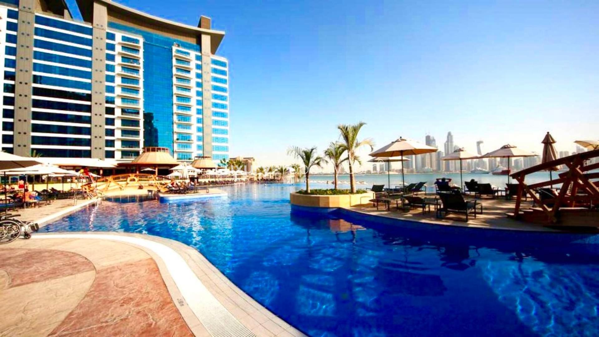 High-floor apartment balcony view, Oceana Residence, Palm Jumeirah, overlooking sea and city skyline