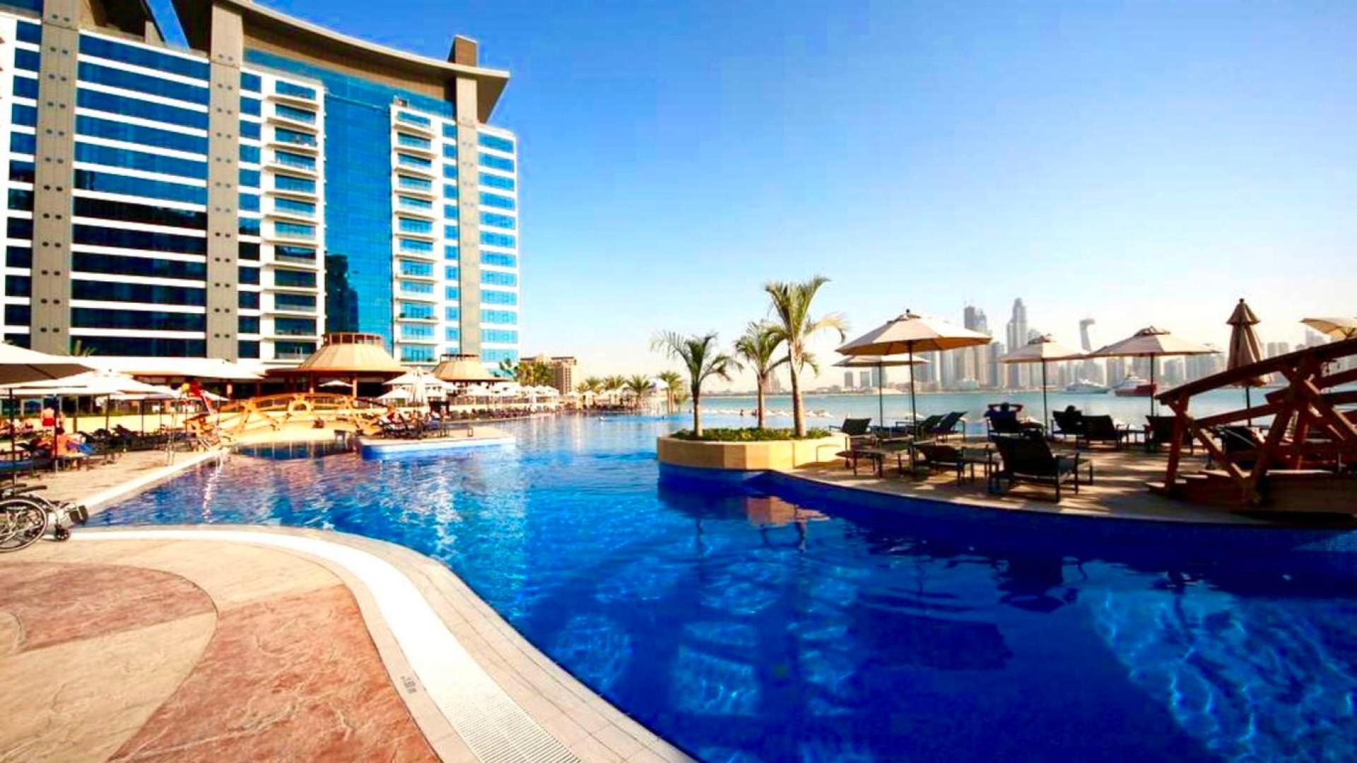 High-floor apartment balcony view, Oceana Residence, Palm Jumeirah, overlooking sea and city skyline