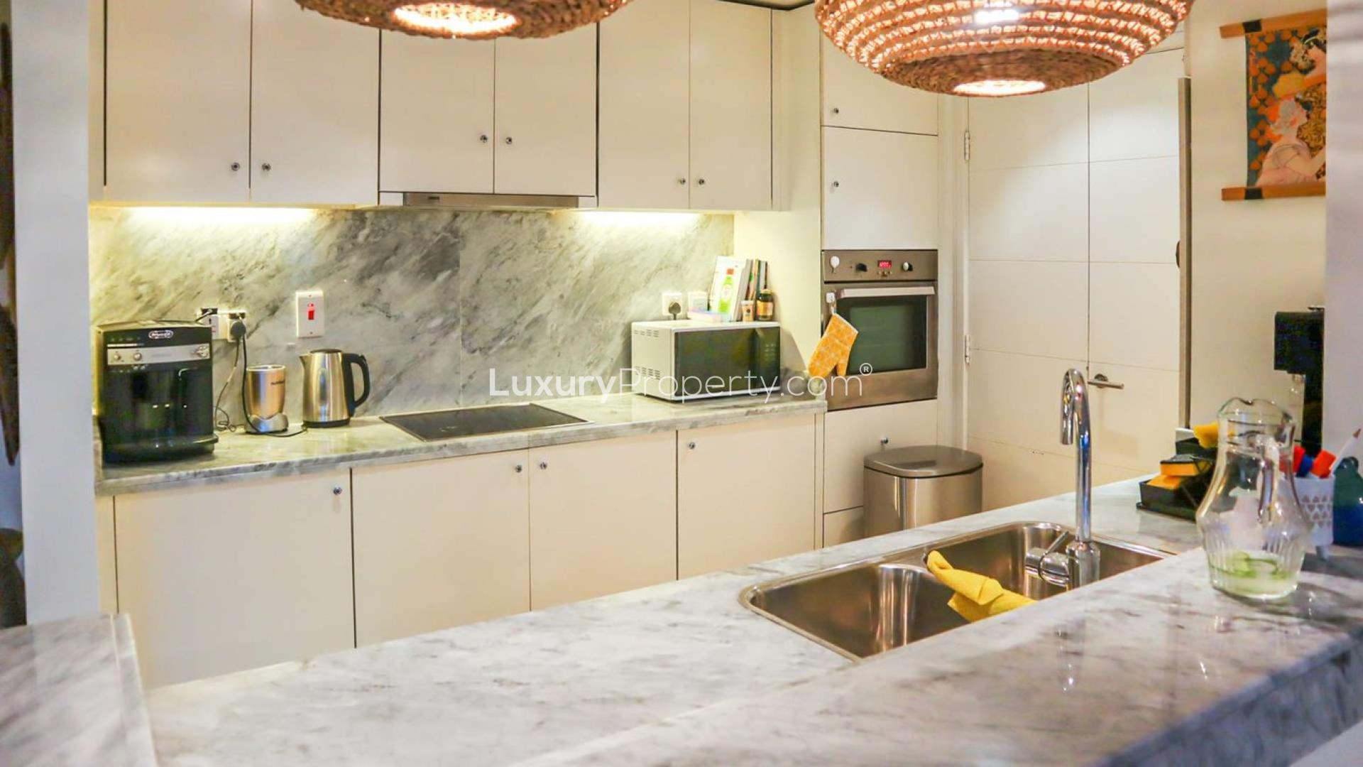 Outdoor terrace with modern seating, South Ridge Tower 3 apartment, Downtown Dubai. Rent opportunity