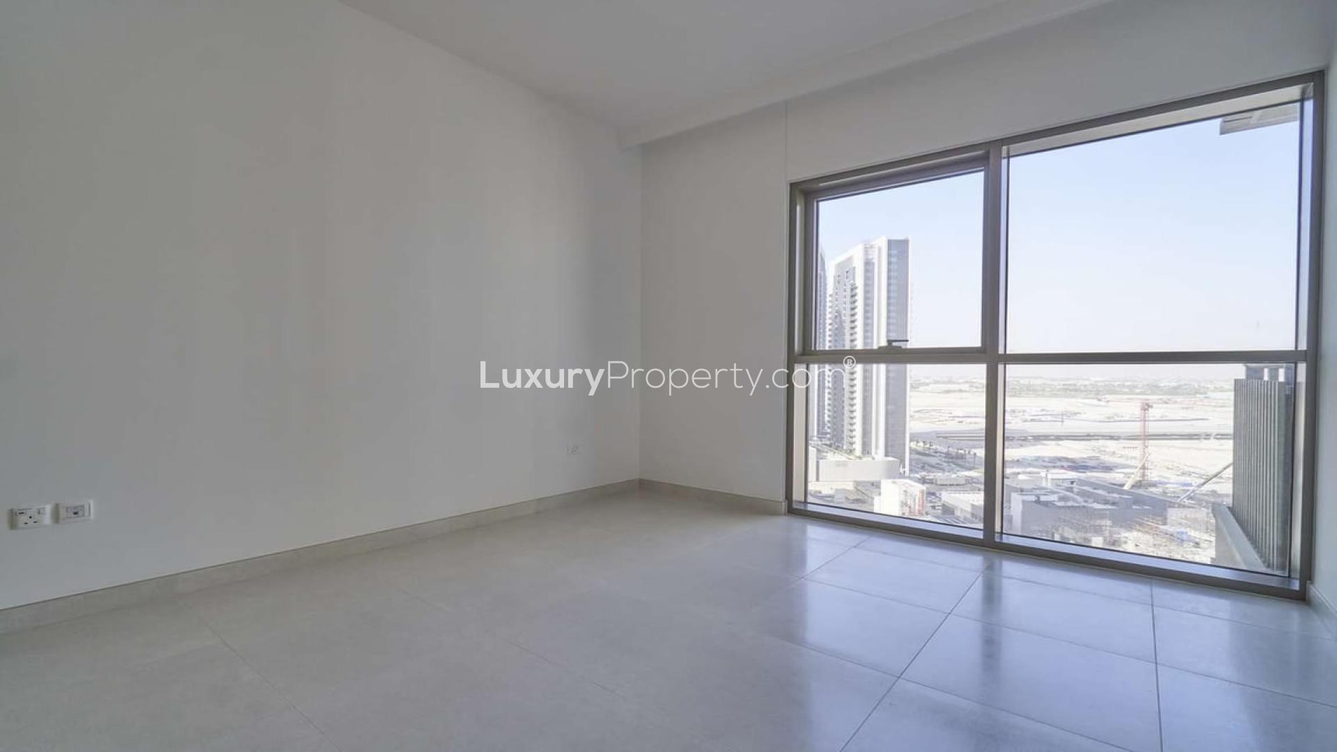 Modern kitchen and living area in one-bedroom apartment, Dubai Creek Harbour, Creekside 18