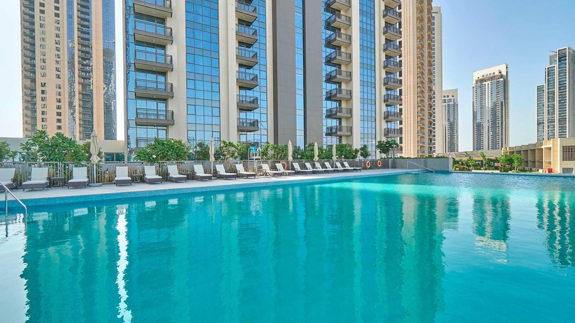 Modern kitchen and living area in 1-bedroom apartment, Creekside 18 B, Dubai Creek Harbour