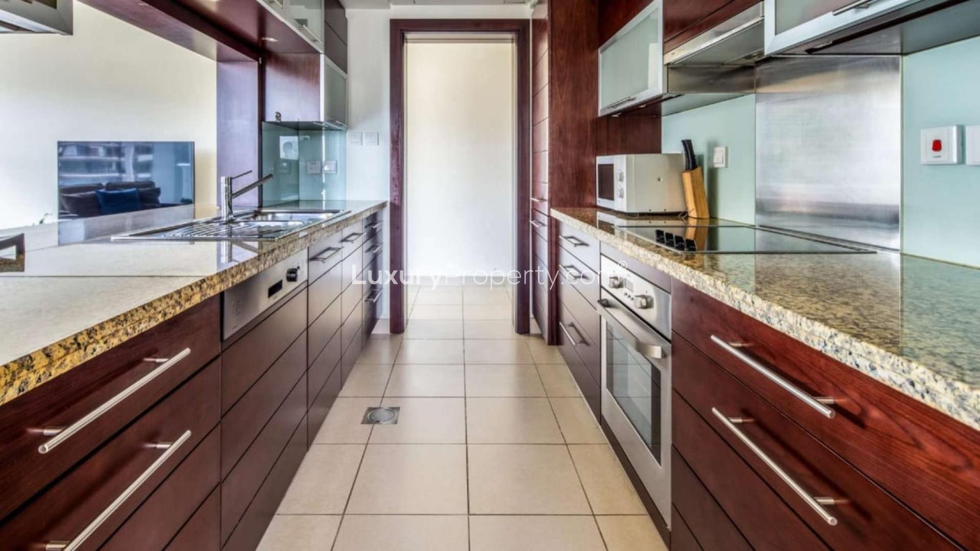 Furnished living area in high-floor apartment, Burj Views, Downtown Dubai, with modern decor