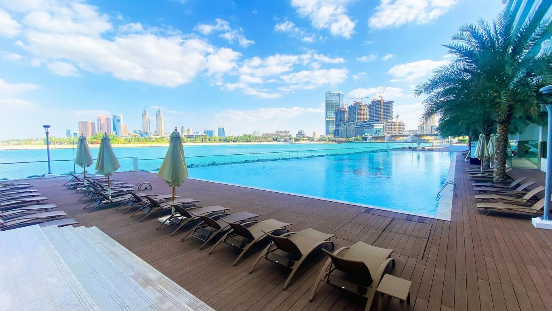 Spacious balcony view from 1-bedroom apartment in Azure Residences, Palm Jumeirah, overlooking skyline