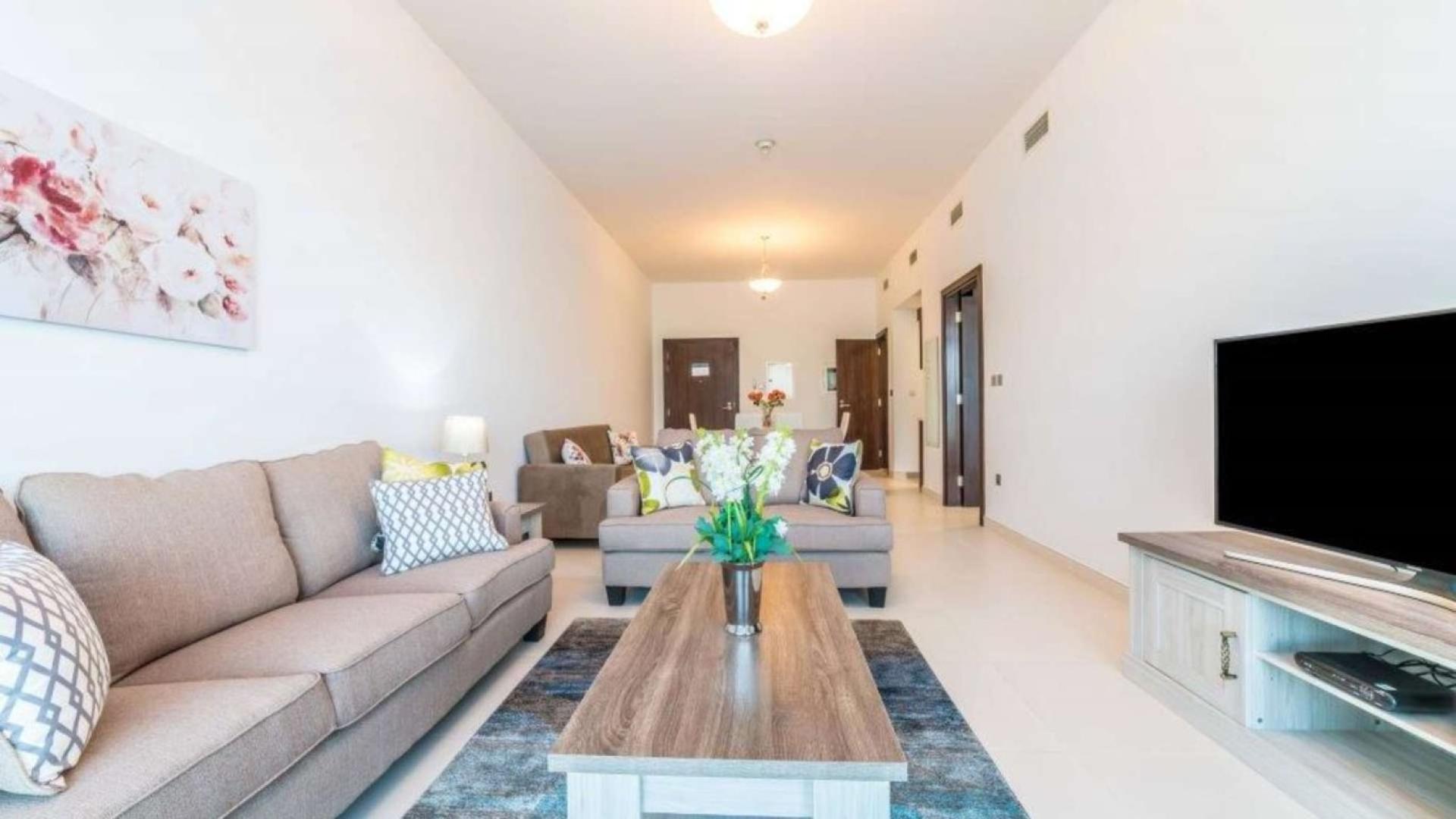 Fully furnished living room with sea views, Palm Jumeirah apartment, Azure Residences