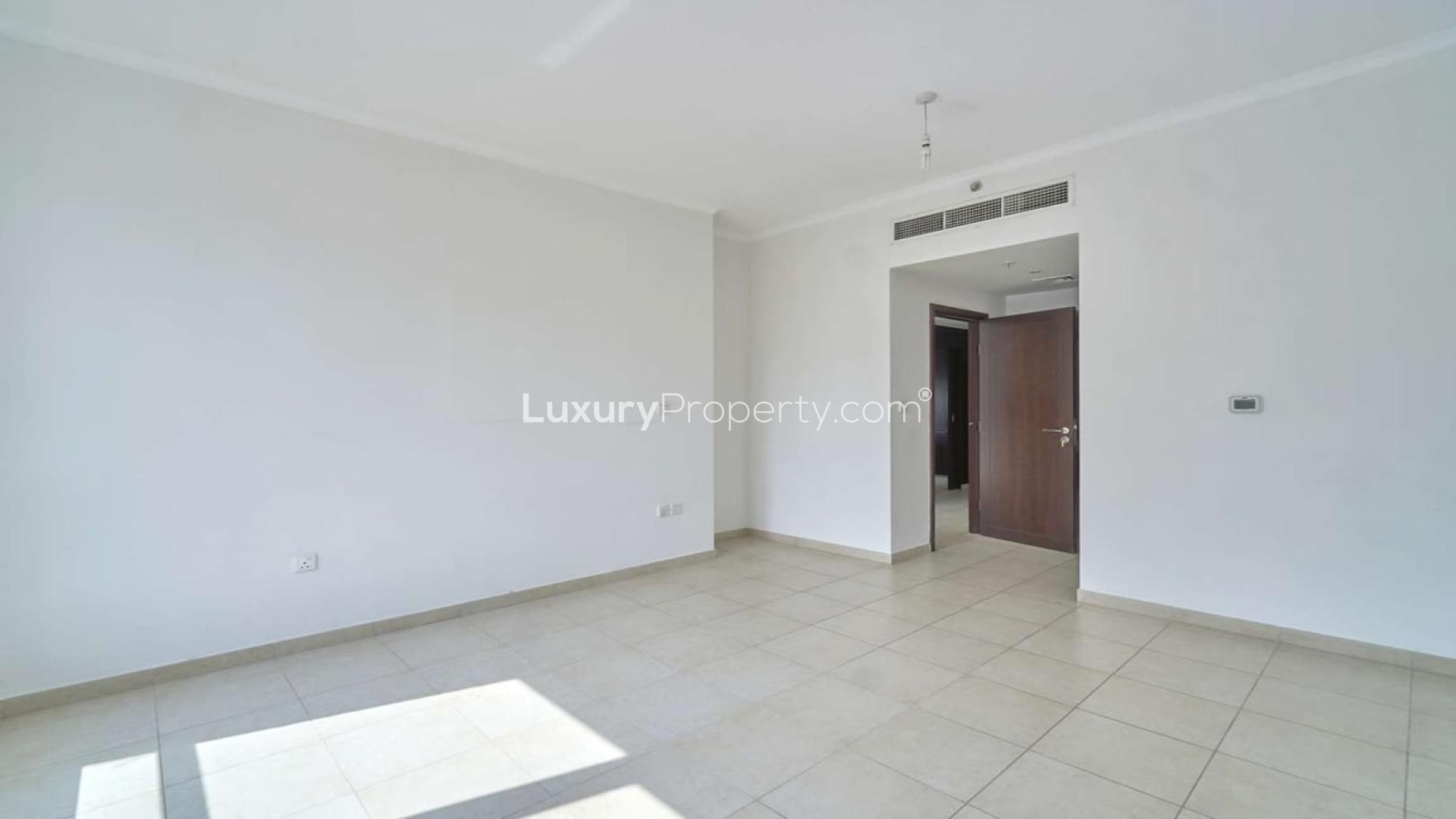 Modern kitchen and open living area in Downtown Dubai apartment for rent, The Residences