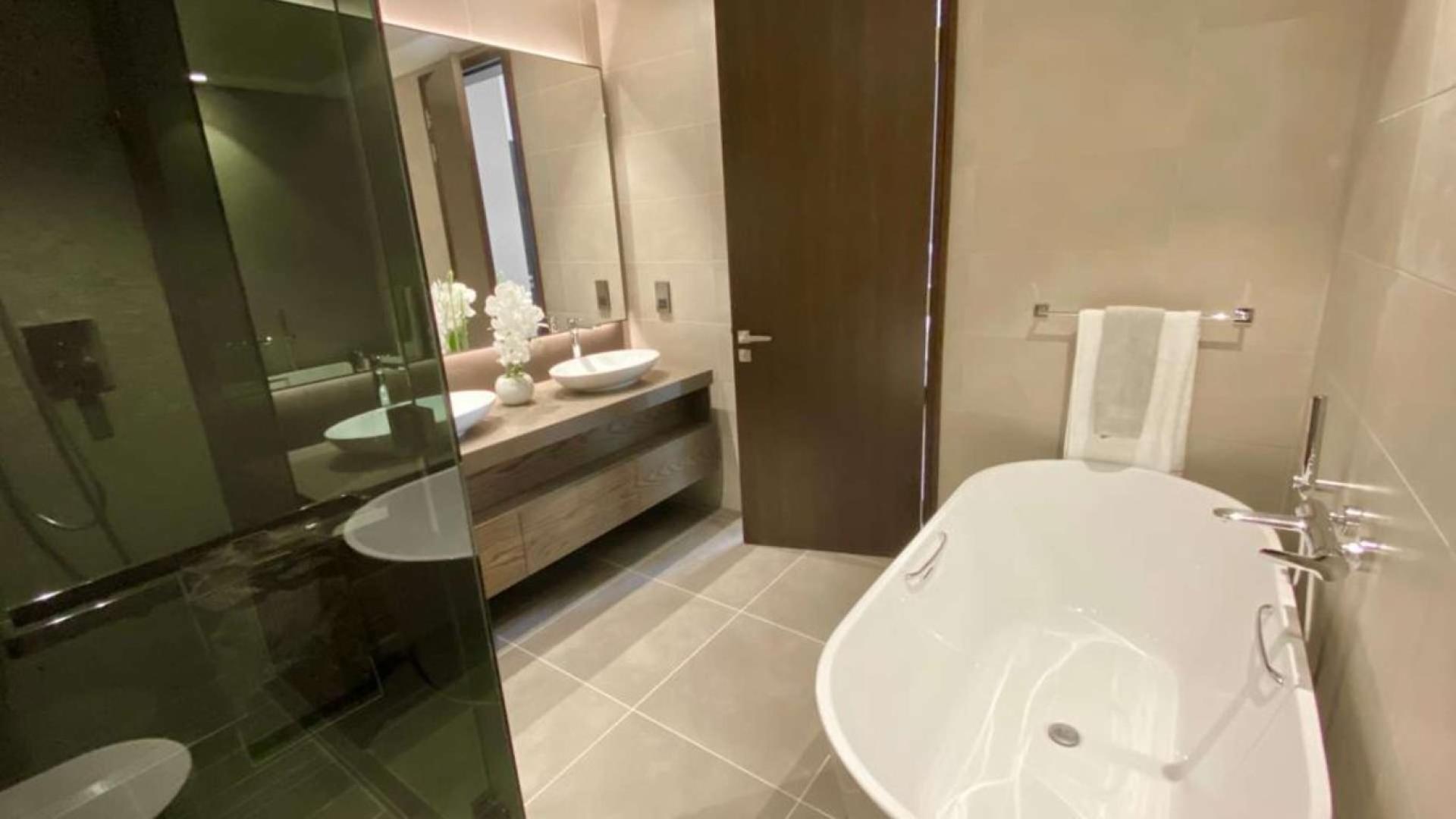 Balcony view from luxury apartment in Marina Gate, Dubai Marina, showing cityscape and skyscrapers