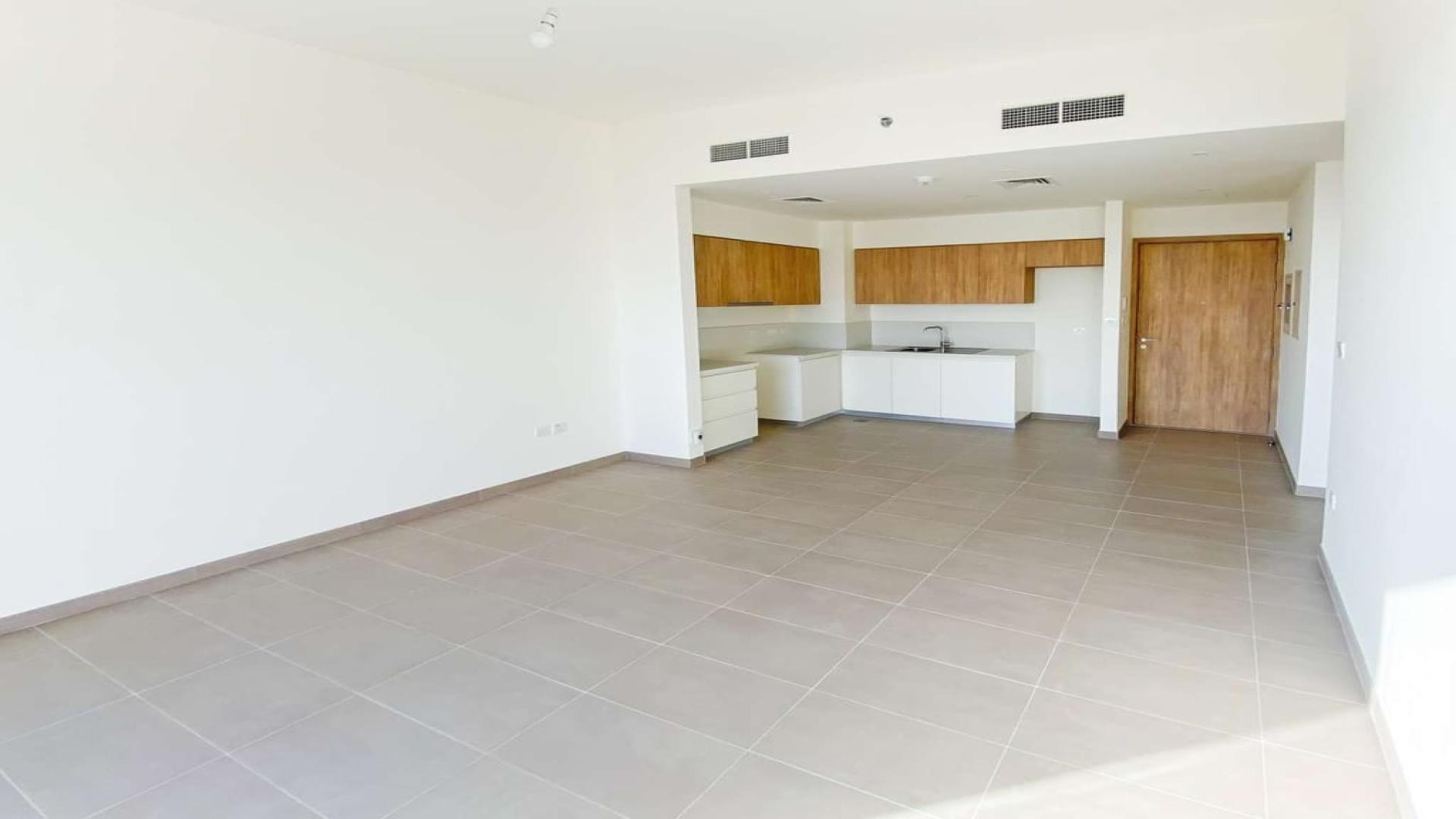 Low-floor apartment interior with balcony, park view, Dubai Hills Estate, Park Ridge rental