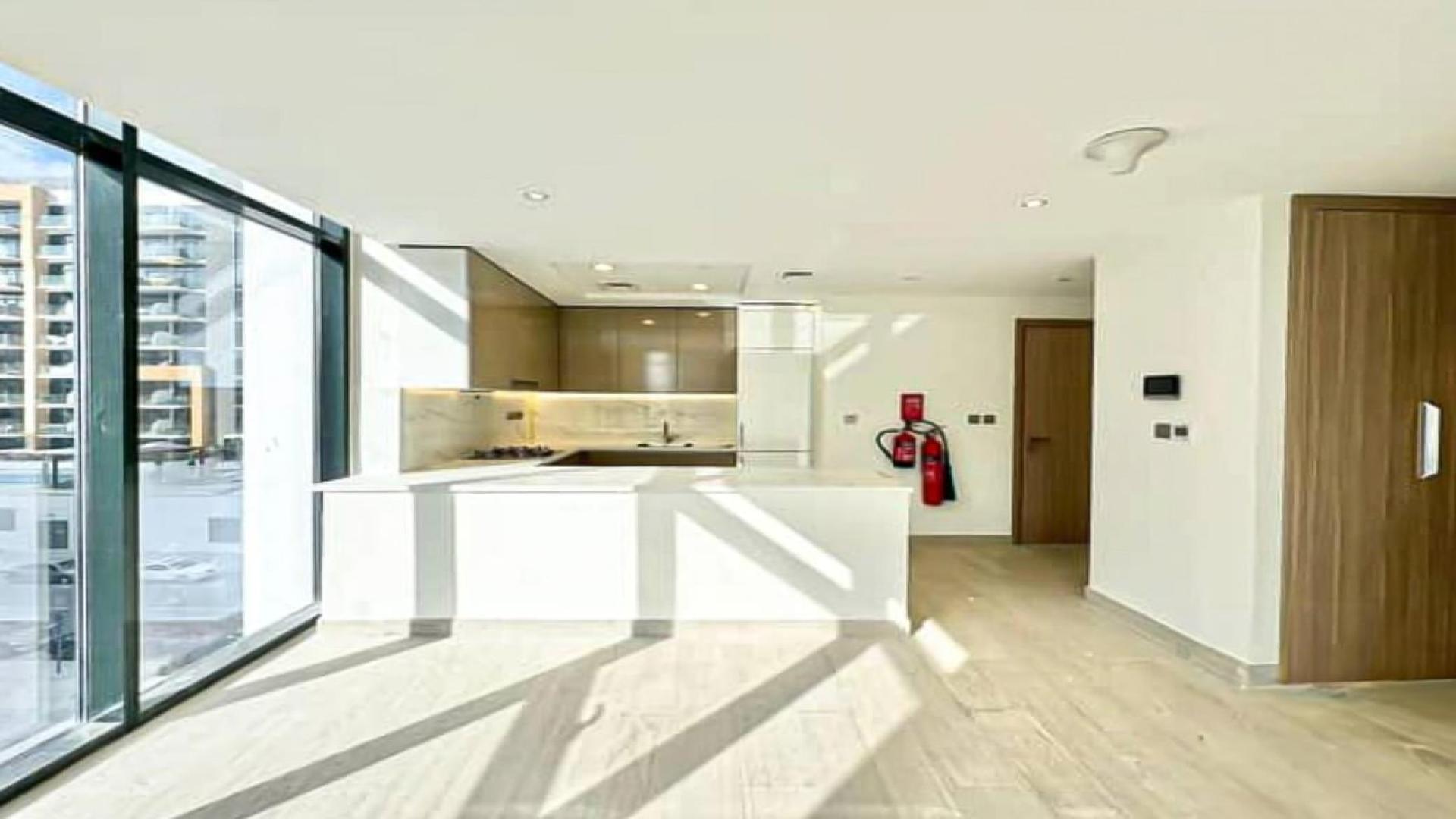 Bright, modern kitchen and living area in Meydan One apartment for rent, LP40499