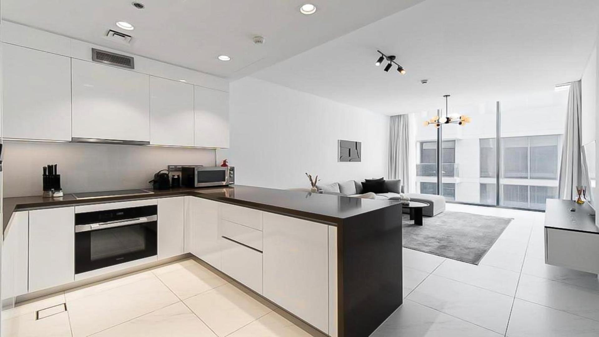 Modern kitchen and living area in apartment, Mohammed Bin Rashid City, District One