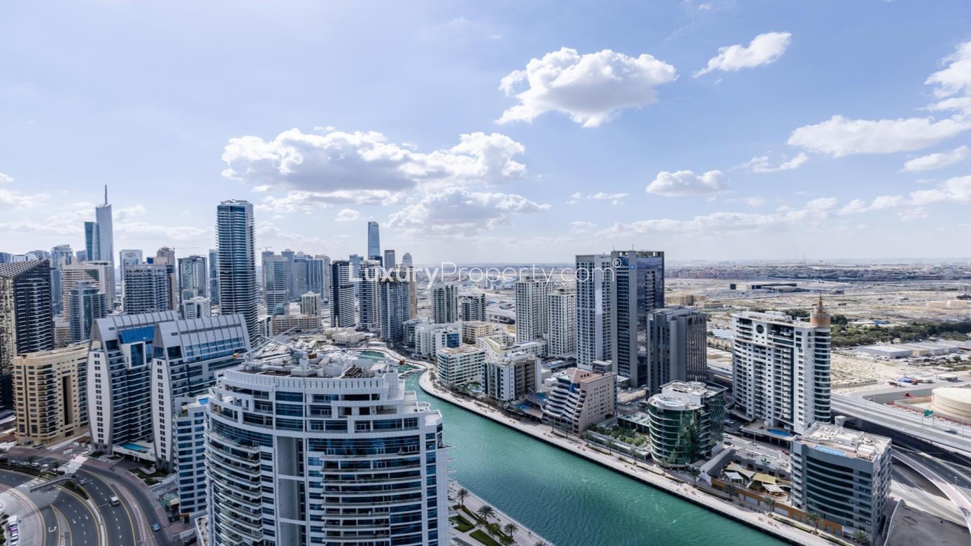 Furnished living room with marina views in The Address Jumeirah Beach Residence apartment