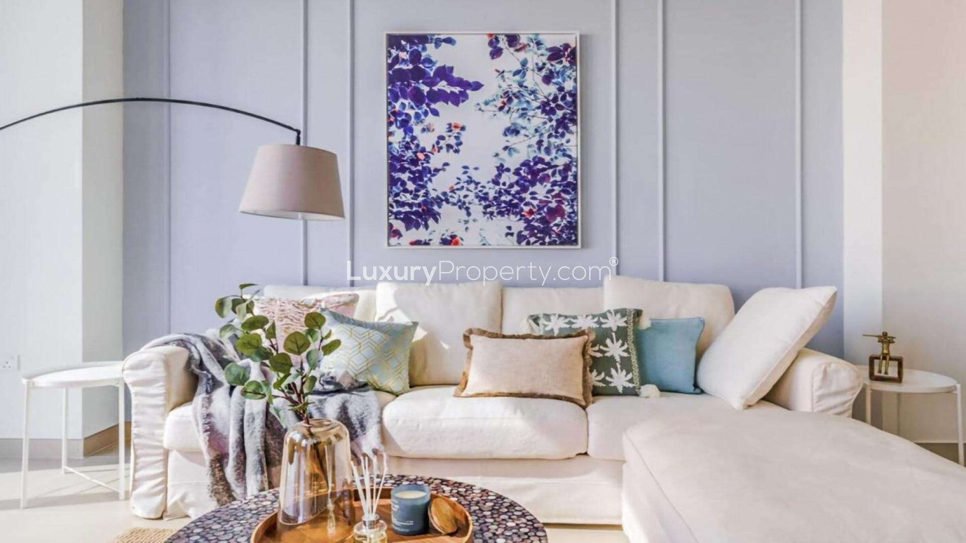 Modern living room in 1-bedroom apartment, Dubai Marina, featuring cozy sofa and elegant decor