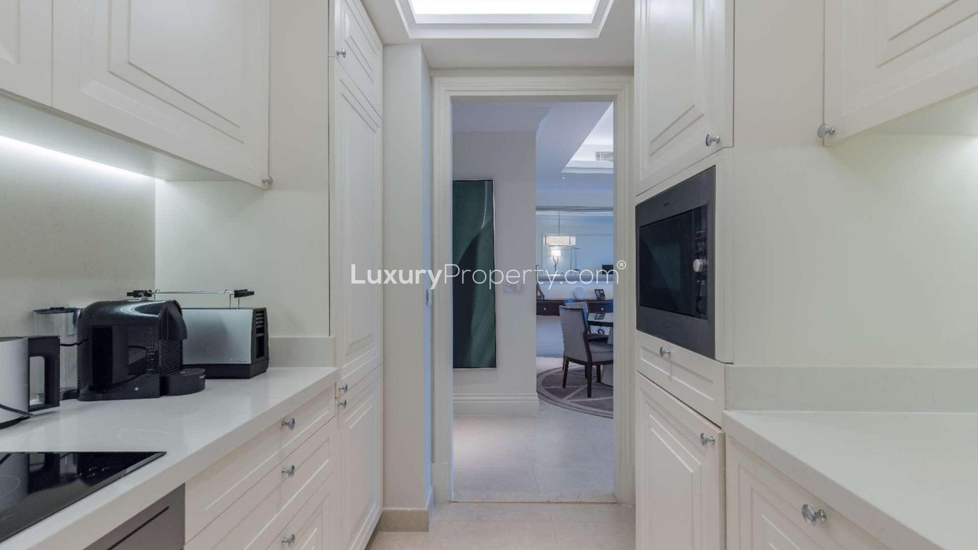 Modern kitchen in upgraded Downtown Dubai apartment, The Address The BLVD, for rent