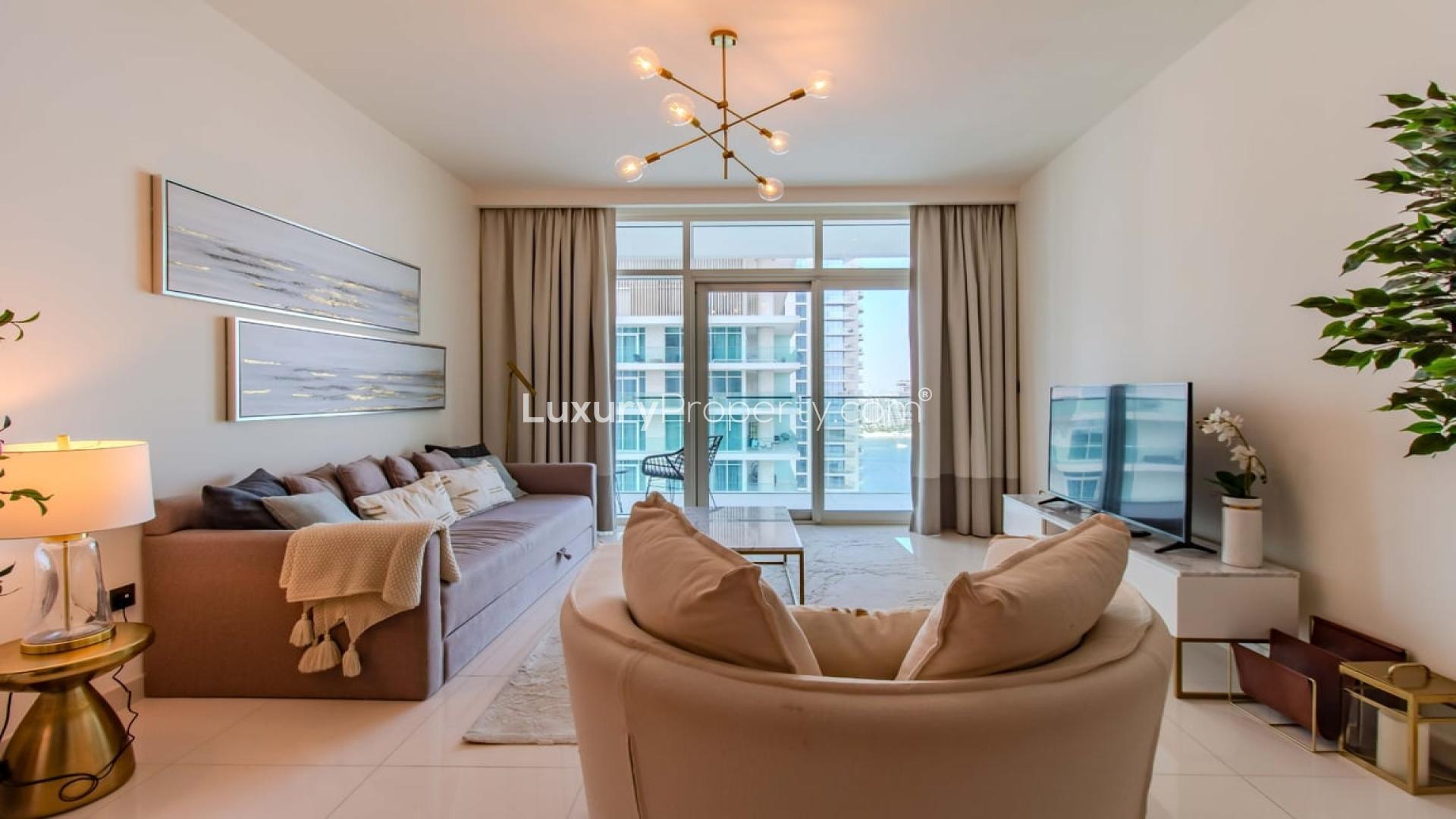 Modern balcony with sea views at Emaar Beachfront apartment in Dubai Harbour