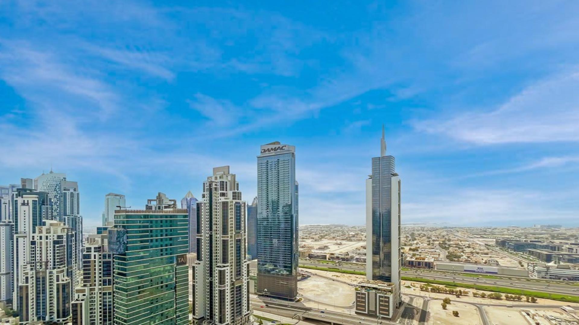 Chic 1-bedroom apartment interior with sea views in BLVD Heights, Downtown Dubai