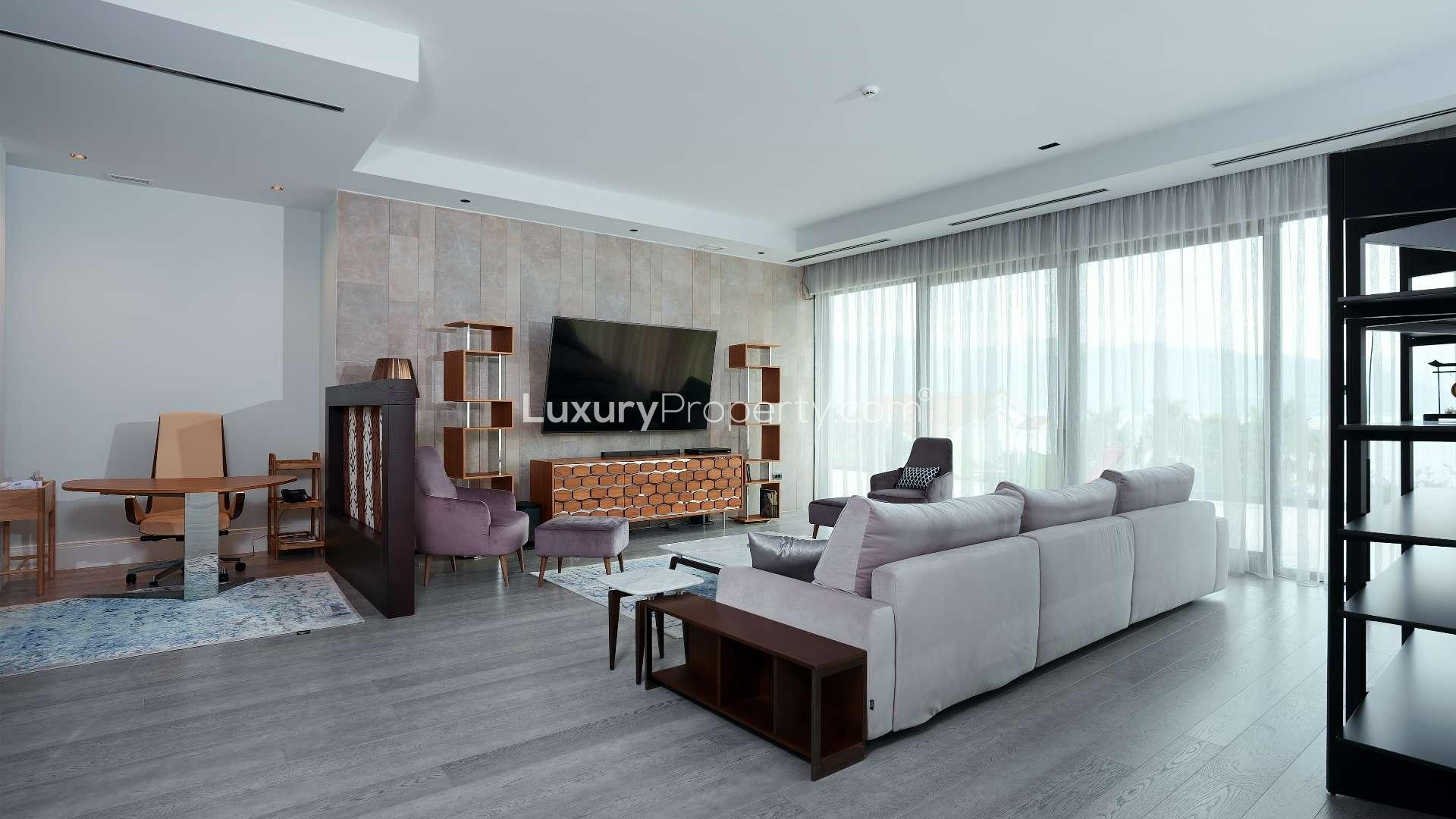 Luxurious open-plan living and dining area in Nikki Beach Montenegro apartment, Tivat