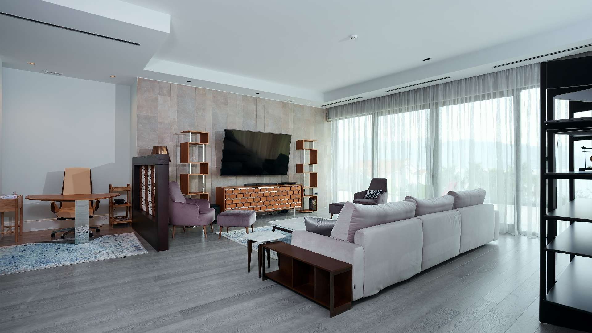 Luxurious open-plan living and dining area in Nikki Beach Montenegro apartment, Tivat
