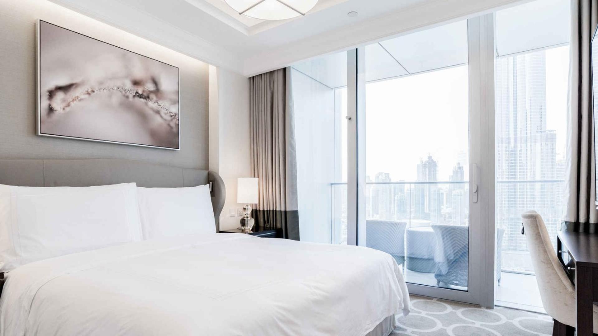 Luxury 1-bedroom apartment living room in The Address Boulevard, Downtown Dubai, elegant decor