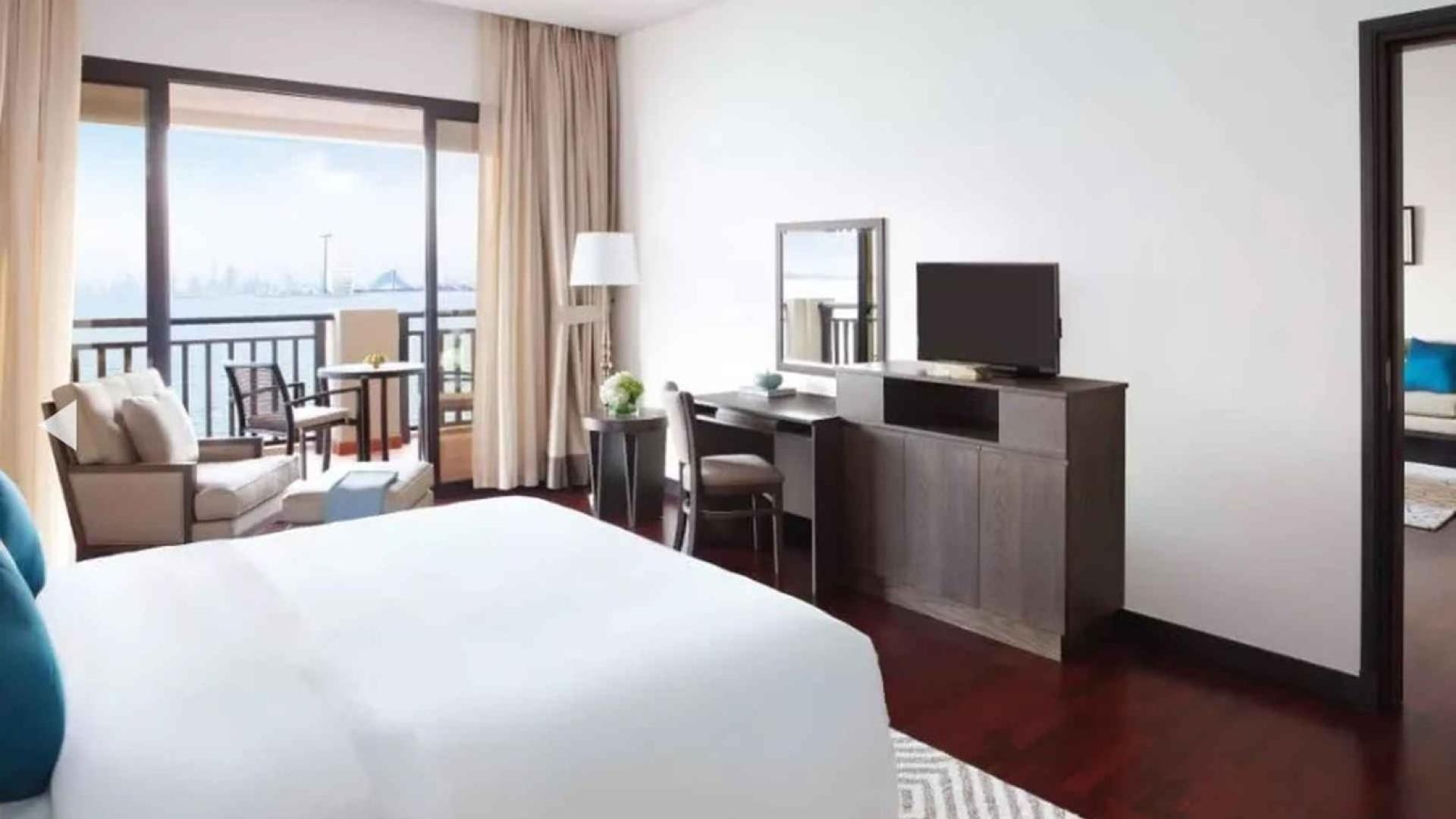 Aerial view of Anantara Residences, Palm Jumeirah, showcasing luxury apartments and waterfront scenery