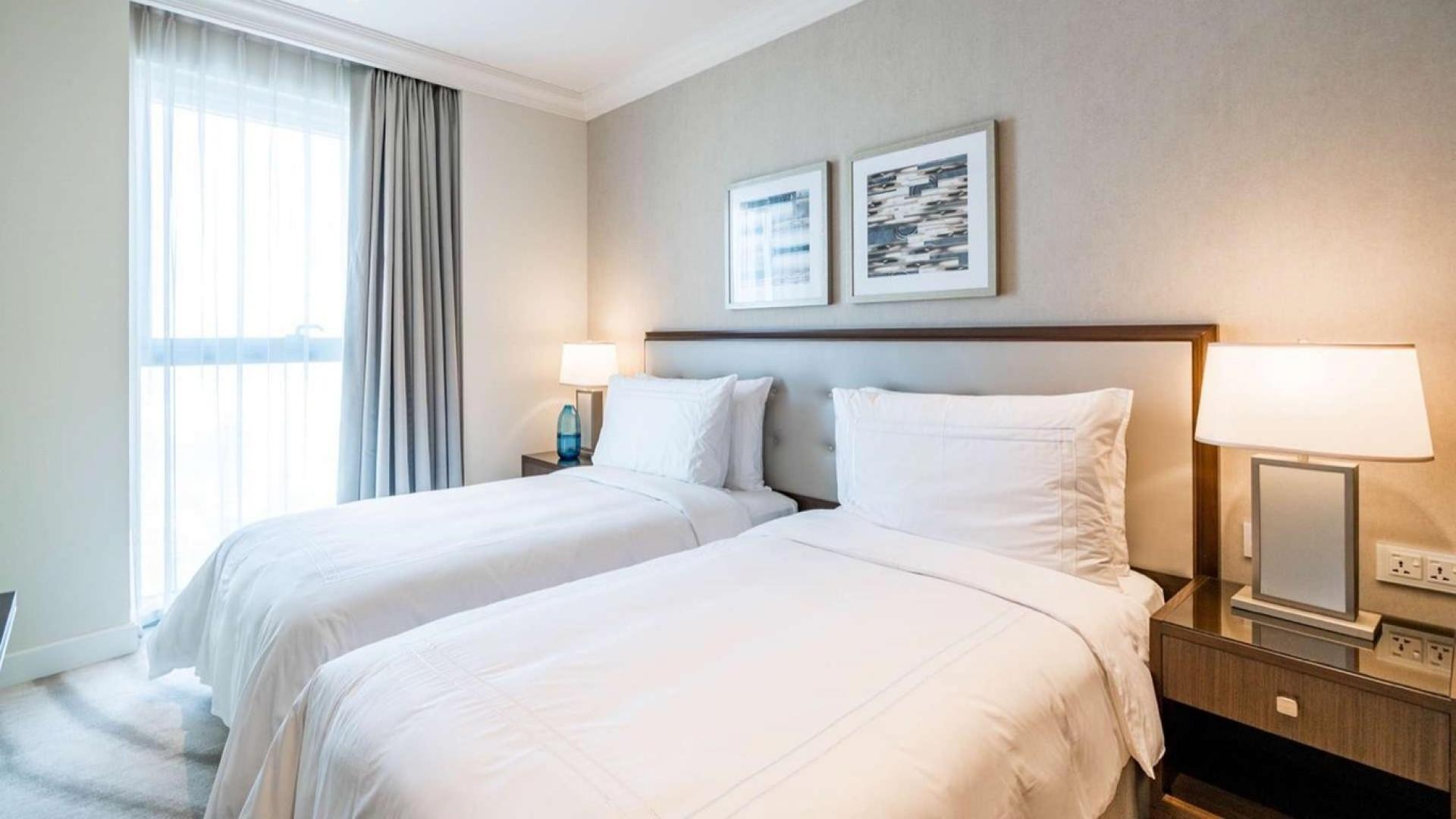 Luxurious living room in one-bedroom apartment at The Address Residences Fountain Views, Downtown Dubai