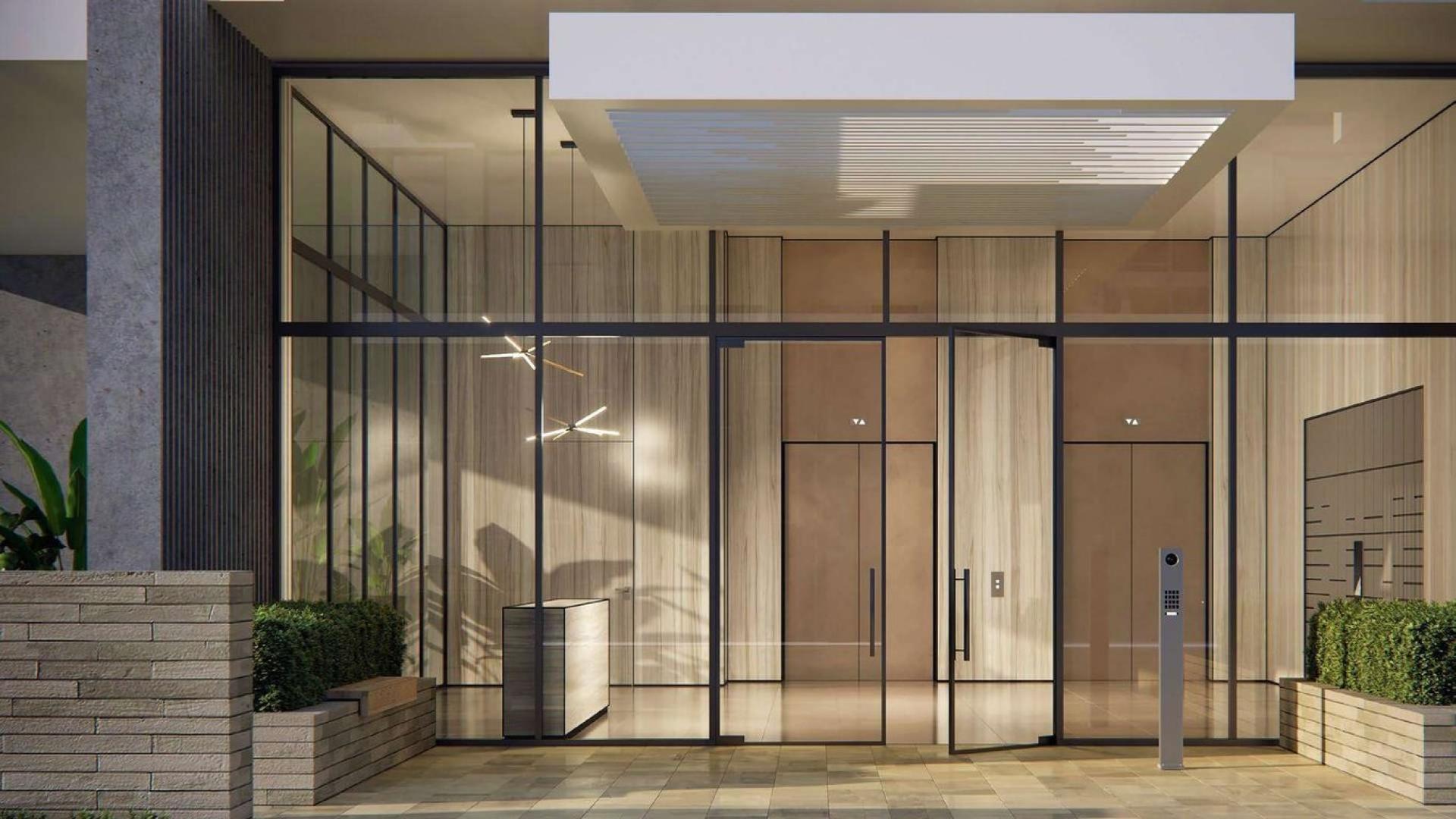 Ultramodern entrance of Beachside Residences 6 apartment in Tilal Al Ghaf, for sale