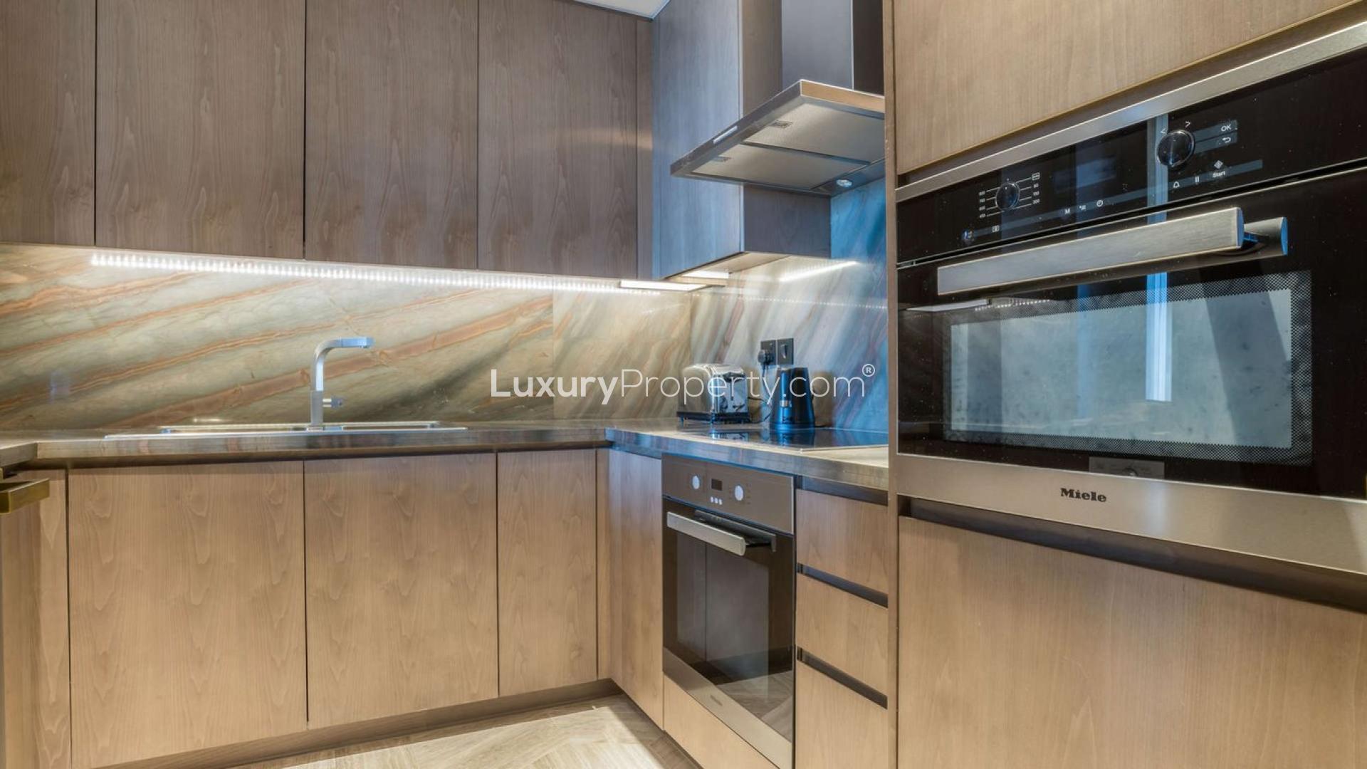 Modern kitchen in two-bedroom serviced apartment, FIVE Palm Jumeirah, for sale
