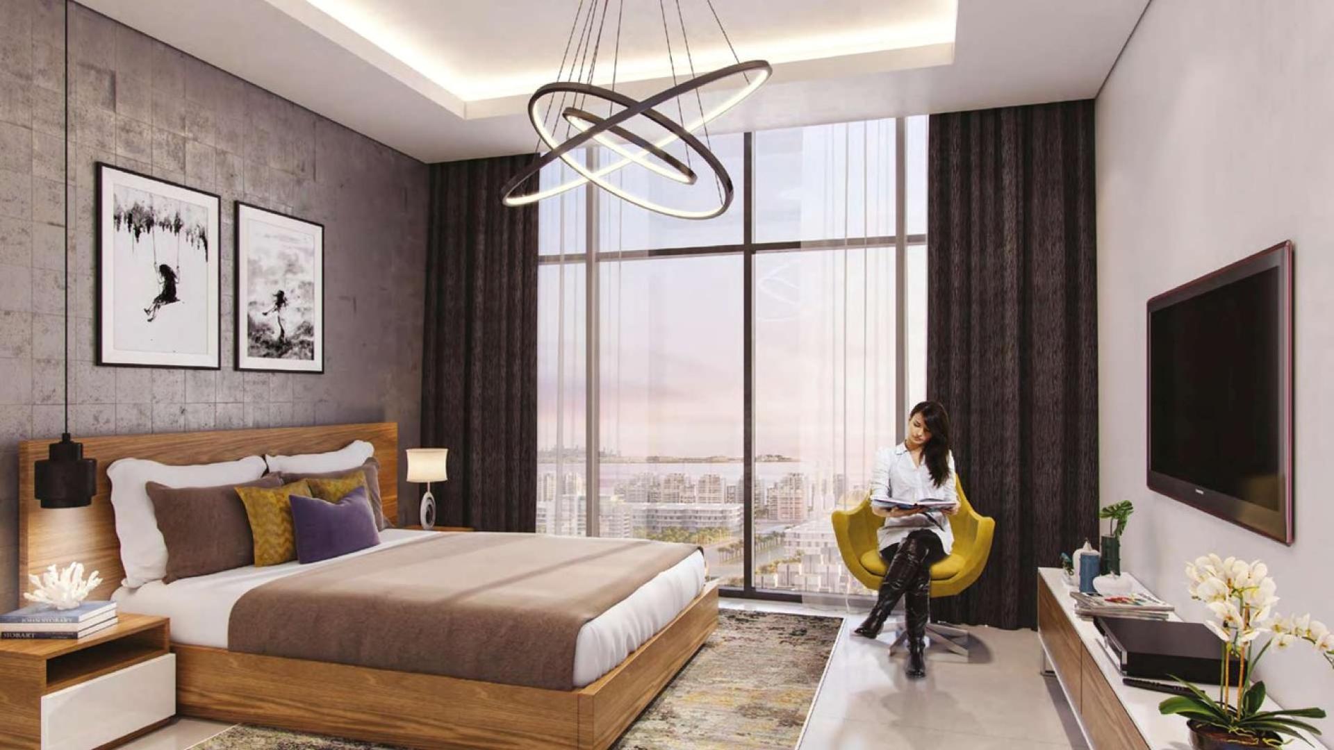 Modern living room and kitchen in one-bedroom Meydan One apartment, Riviera 28