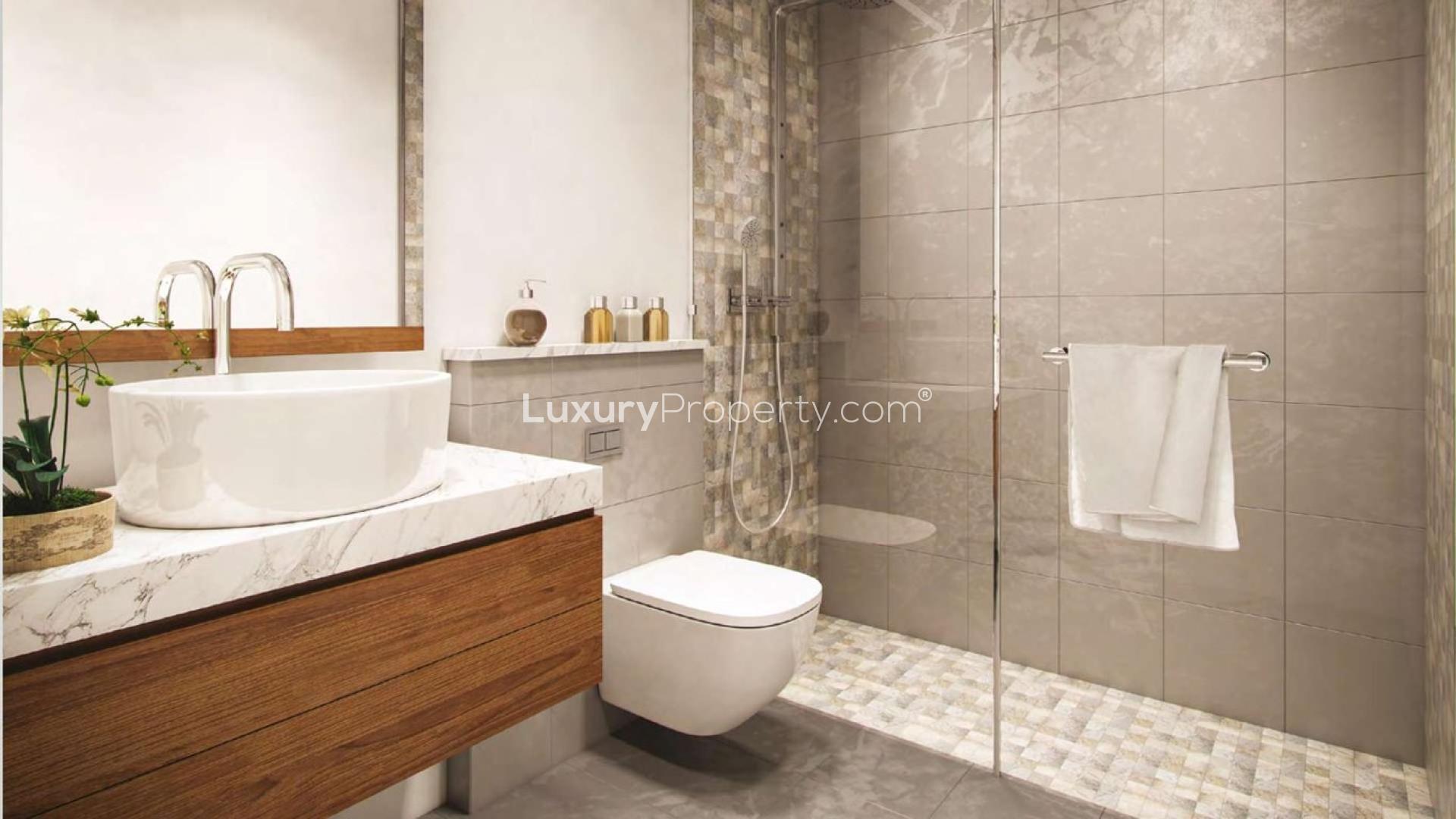 Modern one-bedroom apartment interior in Riviera 28, Meydan One, featuring spacious living area