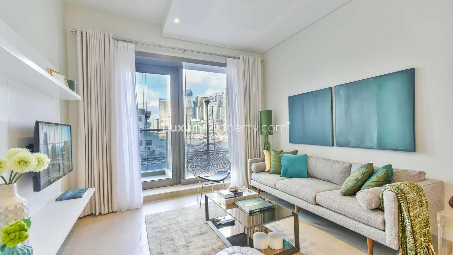 Modern living room in one-bed apartment, Sparkle Towers, Dubai Marina for sale