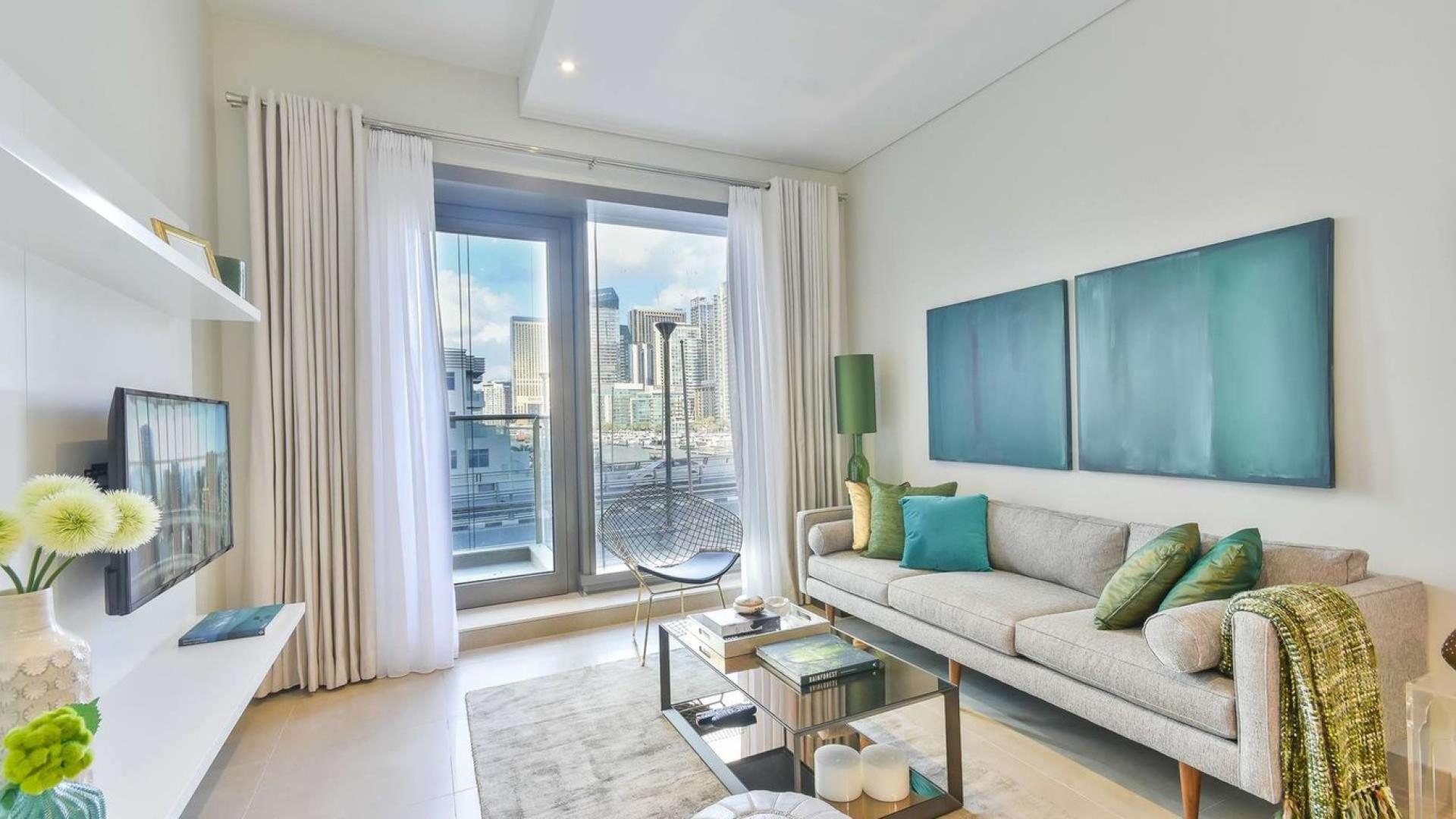 Modern living room in one-bed apartment, Sparkle Towers, Dubai Marina for sale