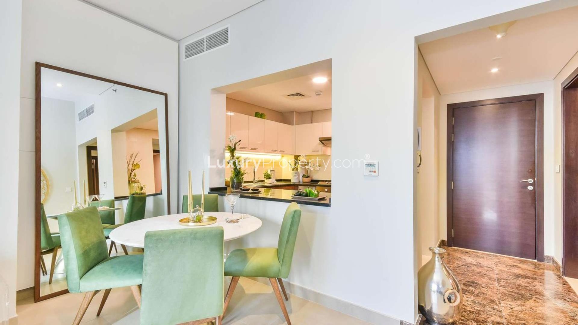 Modern living room in one-bed apartment, Sparkle Towers, Dubai Marina, with city view