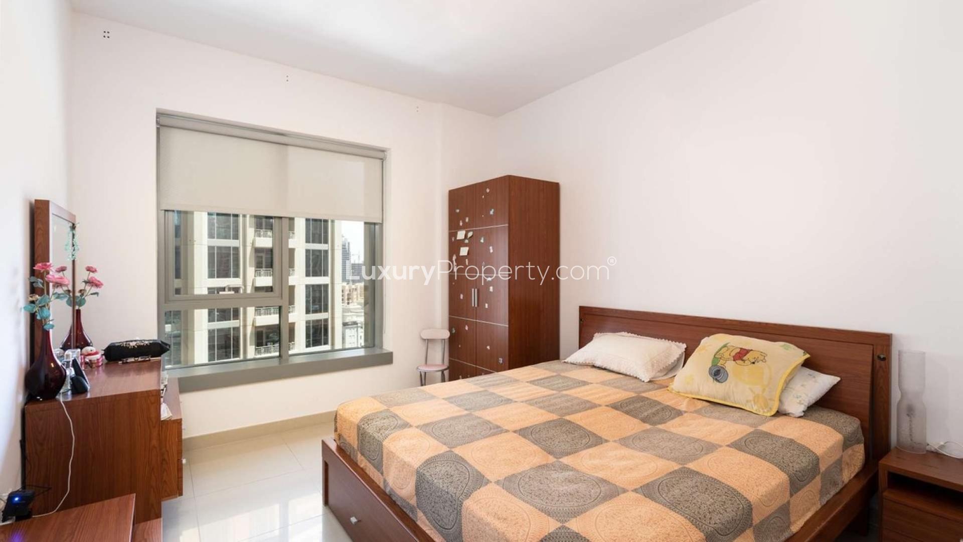 Living room in Downtown Dubai apartment with large windows and modern decor