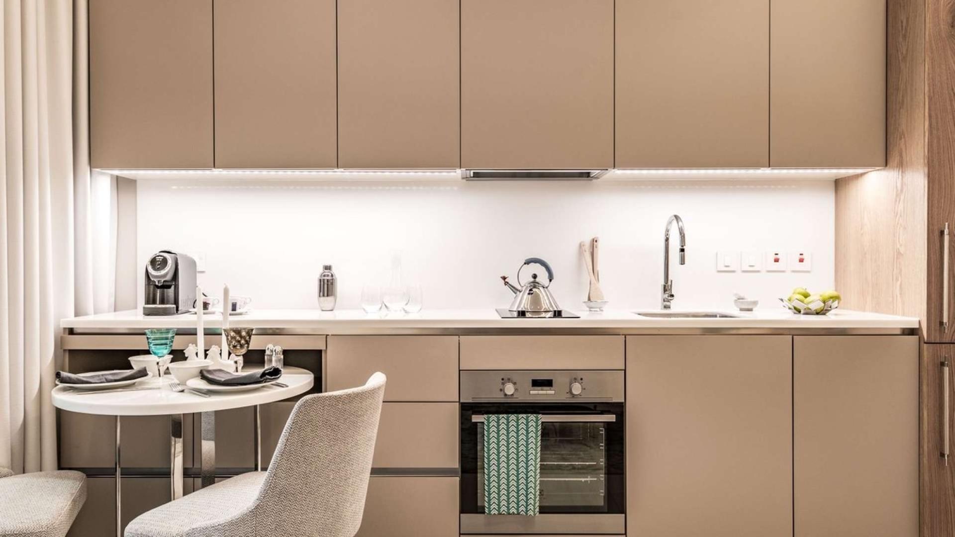 Modern kitchen in SLS Dubai Hotel & Residences studio apartment, Business Bay