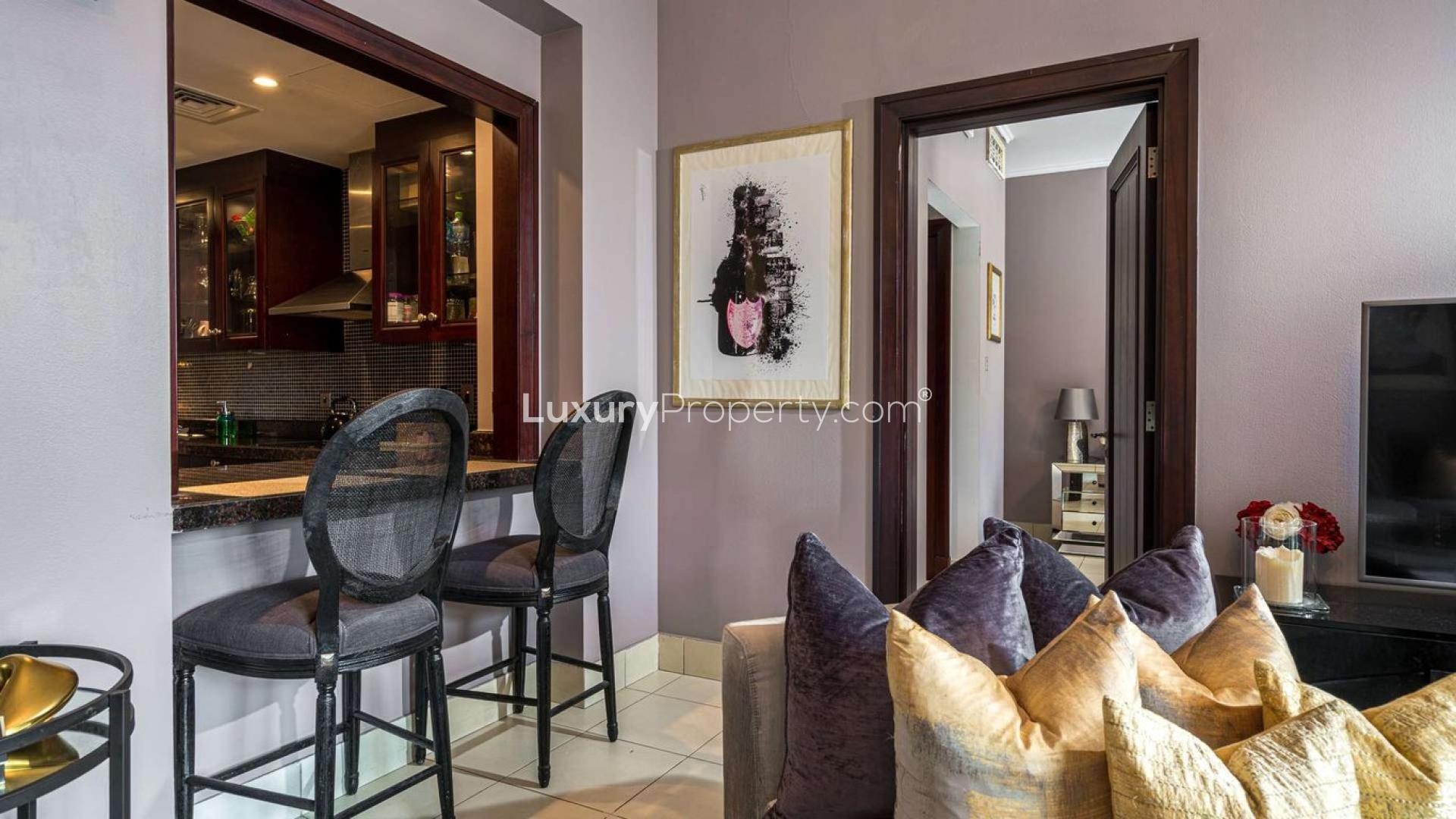 Balcony view from 1-bedroom apartment in Zaafaran, Old Town, overlooking city skyline and gardens