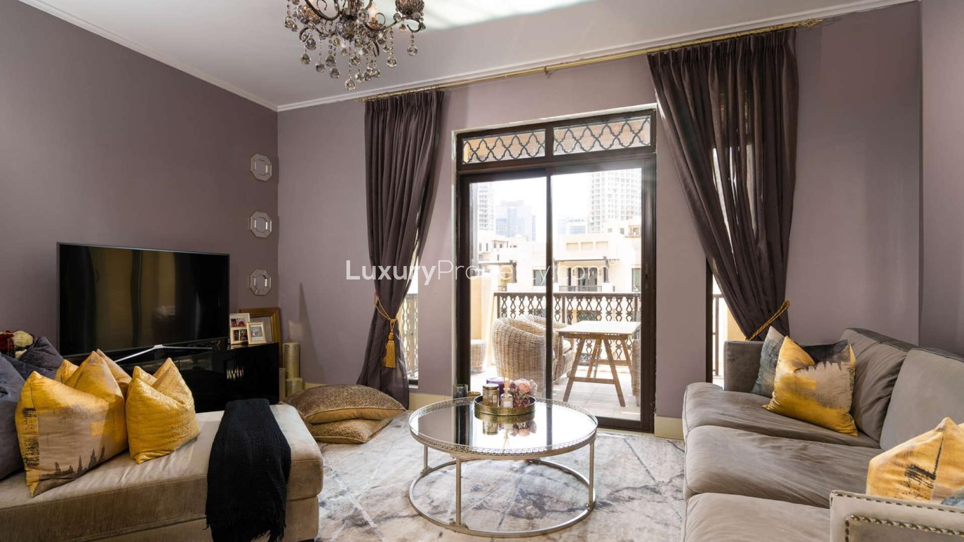 Luxurious living room in Zaafaran apartment with balcony and garden views, Old Town