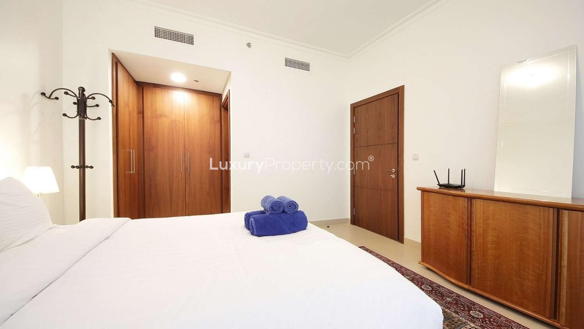 Luxurious furnished living room with Burj Khalifa view in Burj Vista apartment