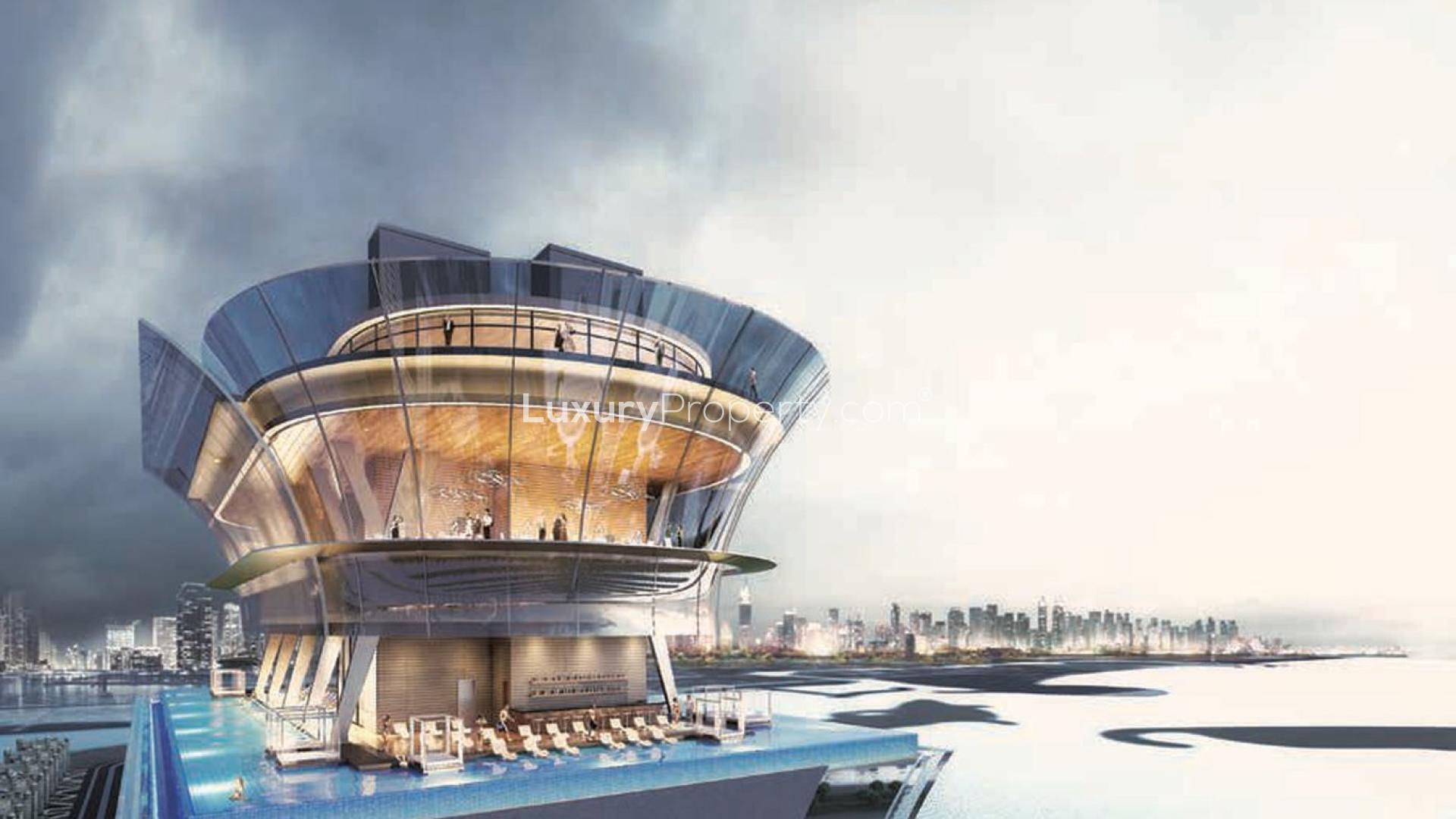 Modern living room and kitchen in Palm Tower apartment with stunning views of Palm Jumeirah