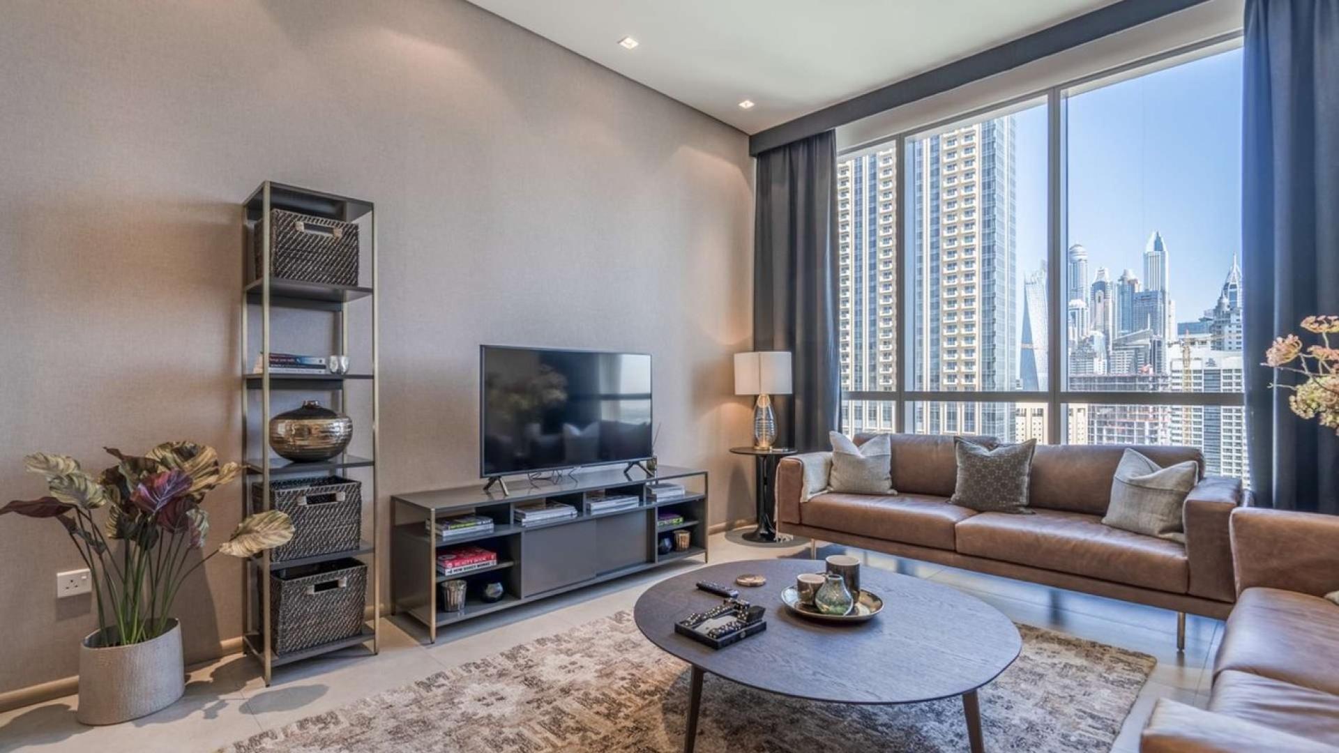 Sustainable penthouse living room with city view, Jumeirah Village Circle, Signature Livings
