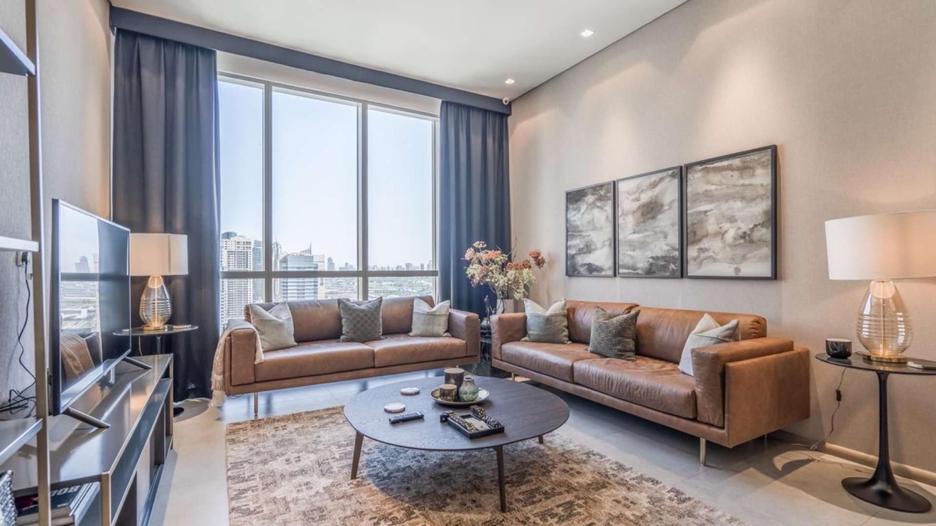 Modern living room in sustainable penthouse, Signature Livings, Jumeirah Village Circle, Dubai