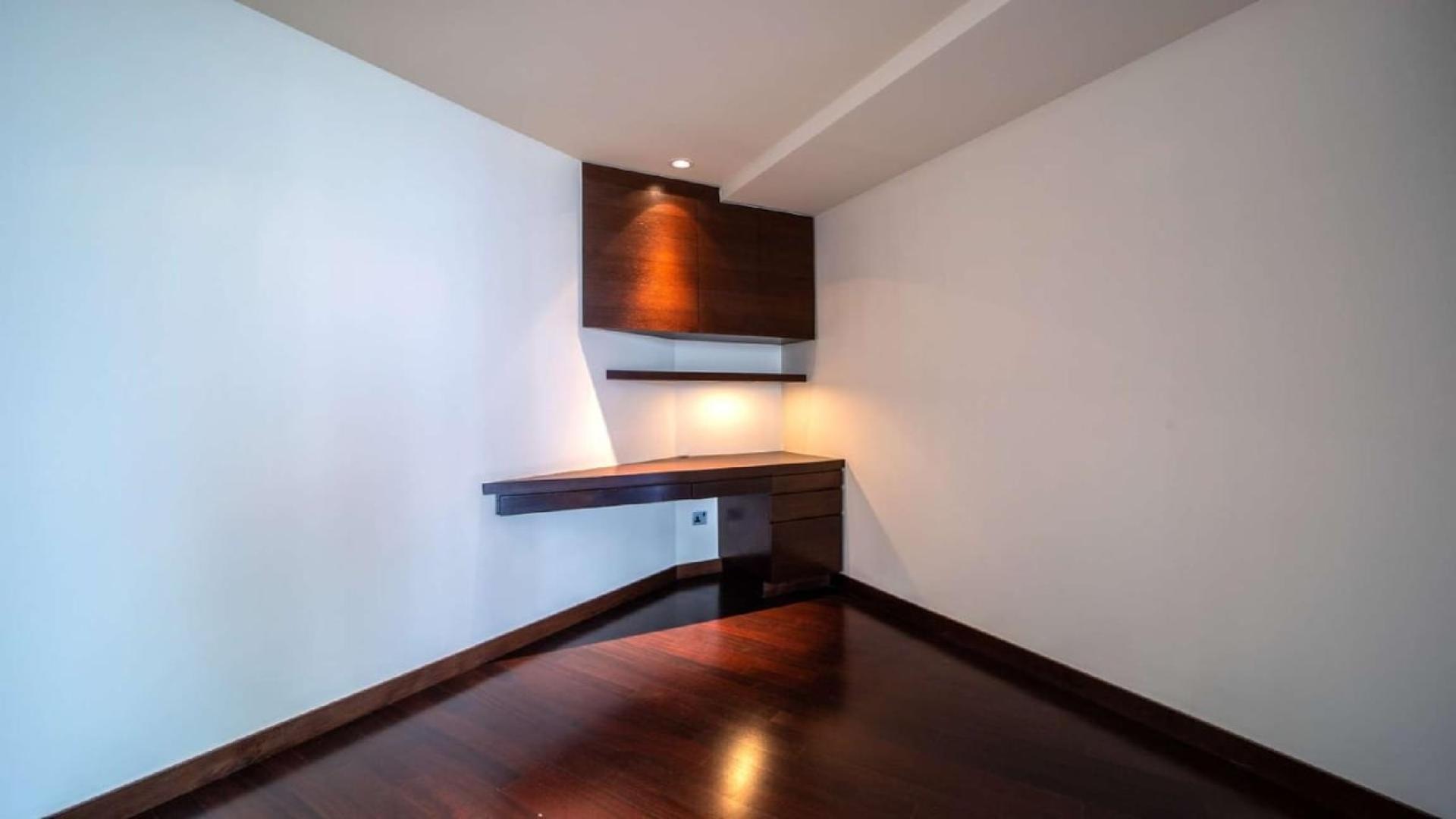 Aerial view of Dubai Fountain and skyscrapers from Burj Khalifa Area apartment for sale